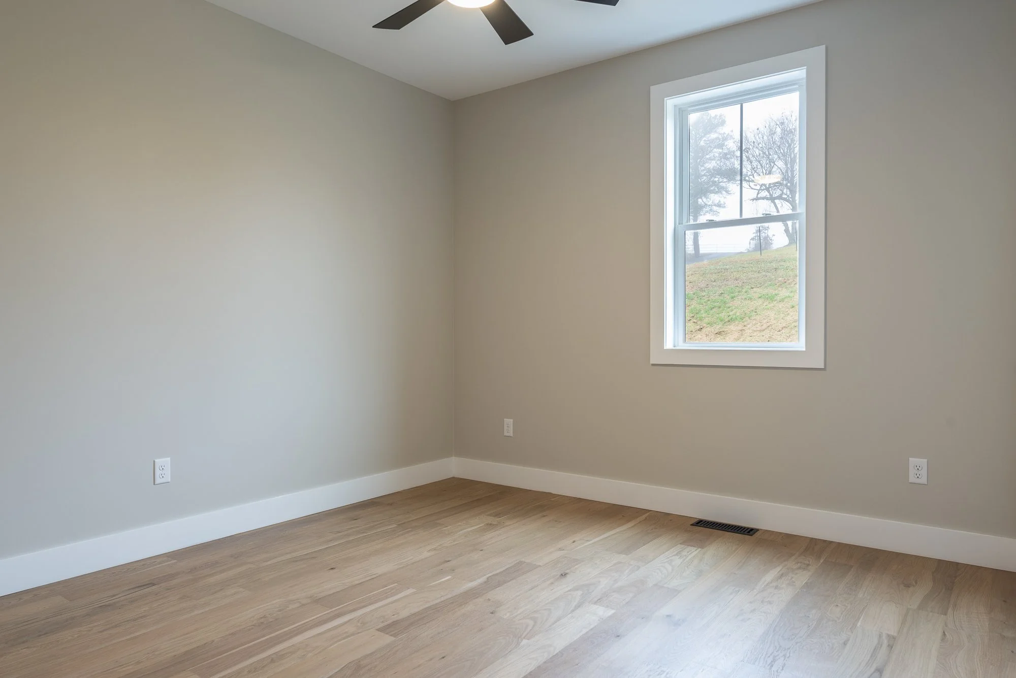 Great room in a modern farmhouse constructed by Plumb Level Square builders in western North Carolina