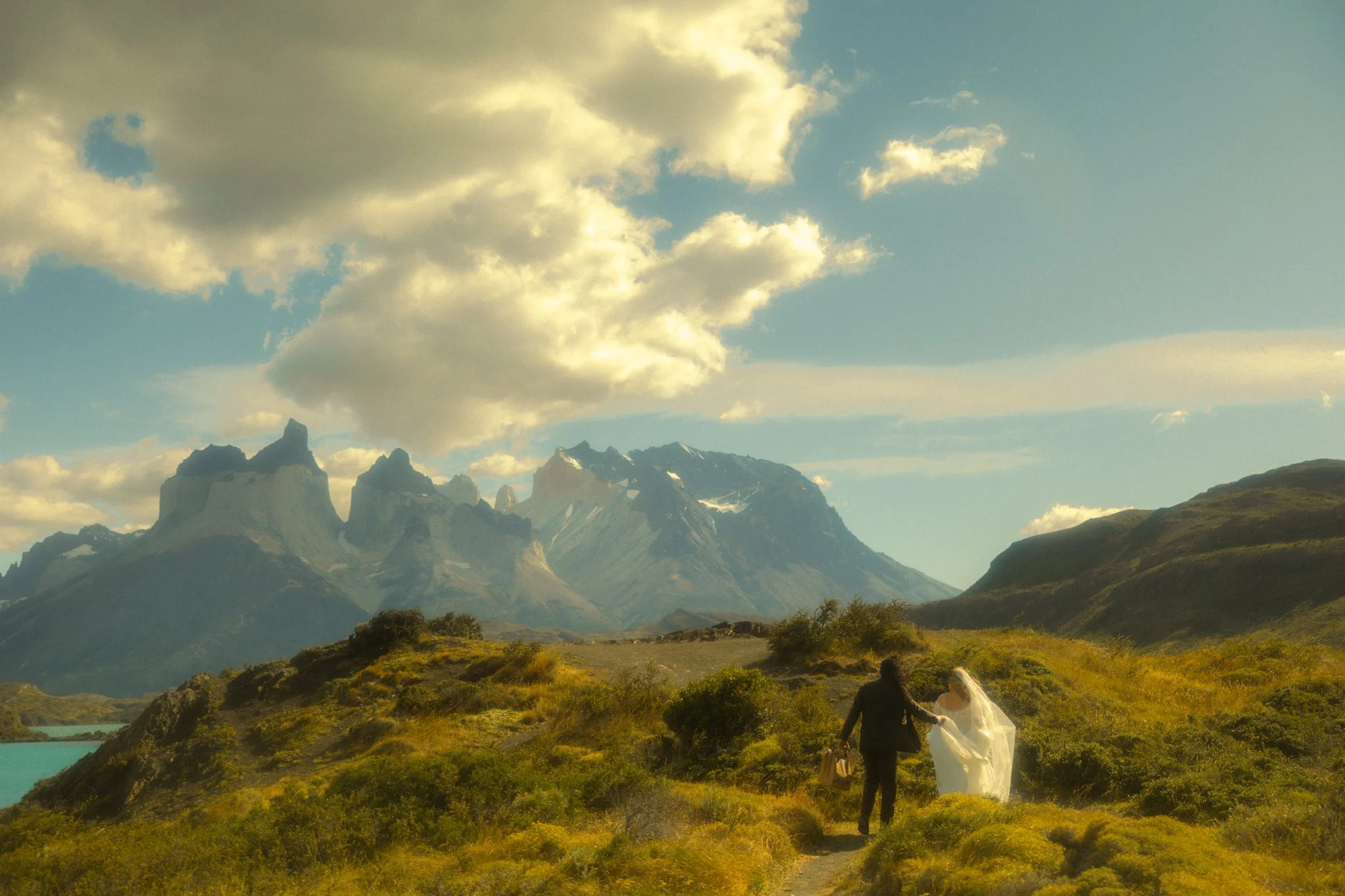 a couple eloping along Lago Pehoe in Torres del Paine National Park in the Chile side of Patagonia