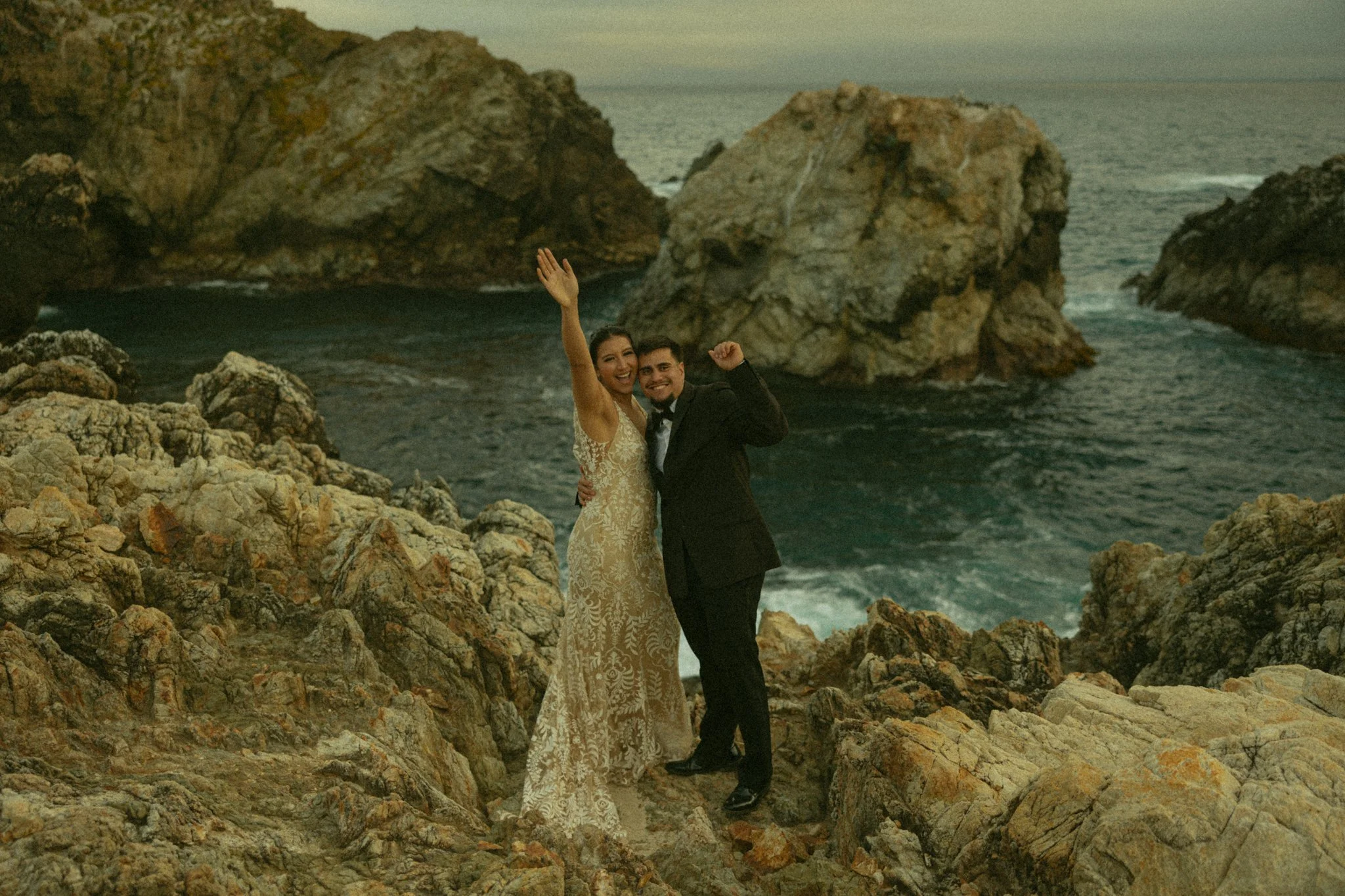 couple eloping on coastal cliffs in Big Sur, California
