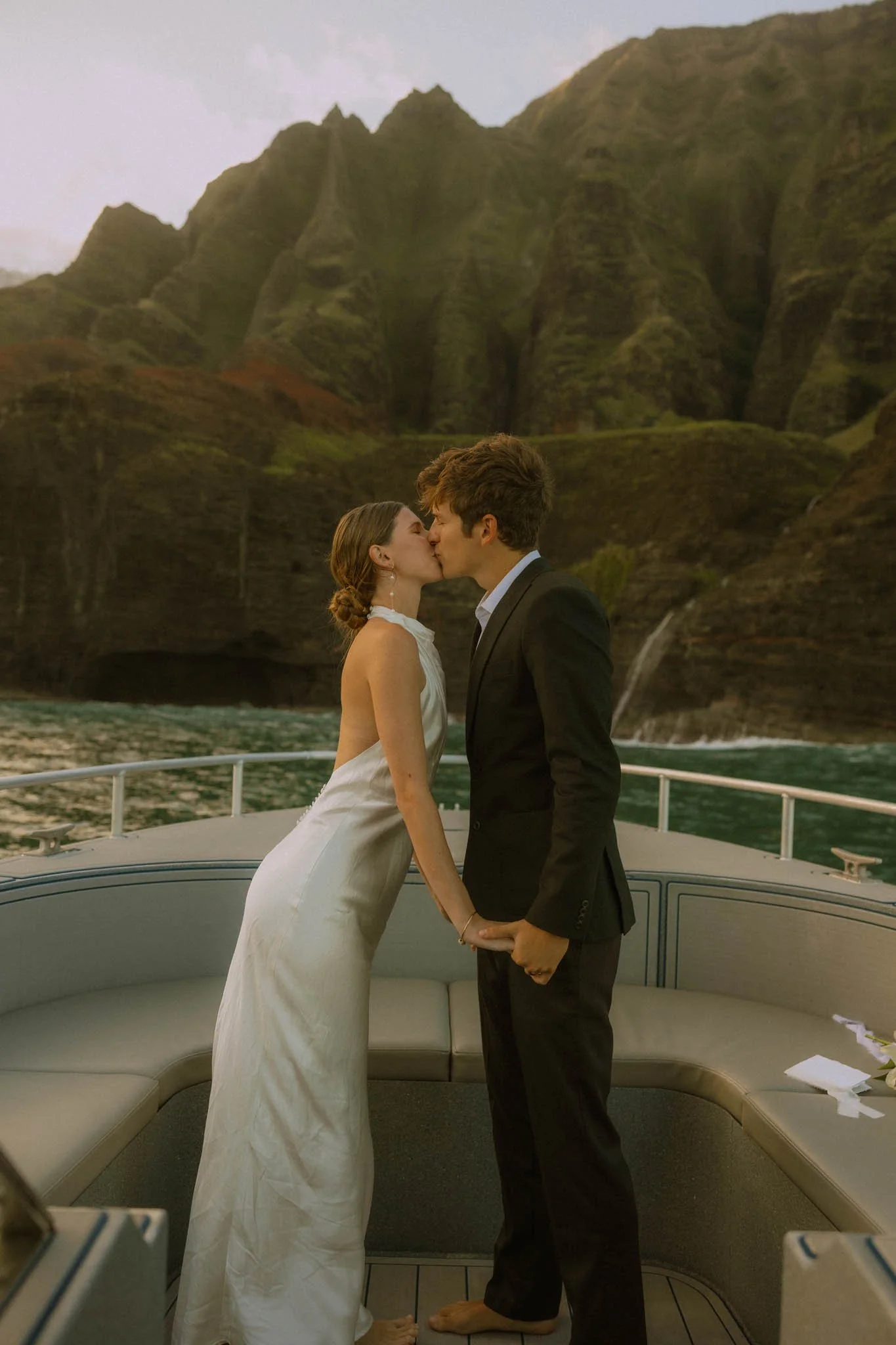 an elopement on a private boat charter along the Na Pali Coast on Kauai, Hawaii
