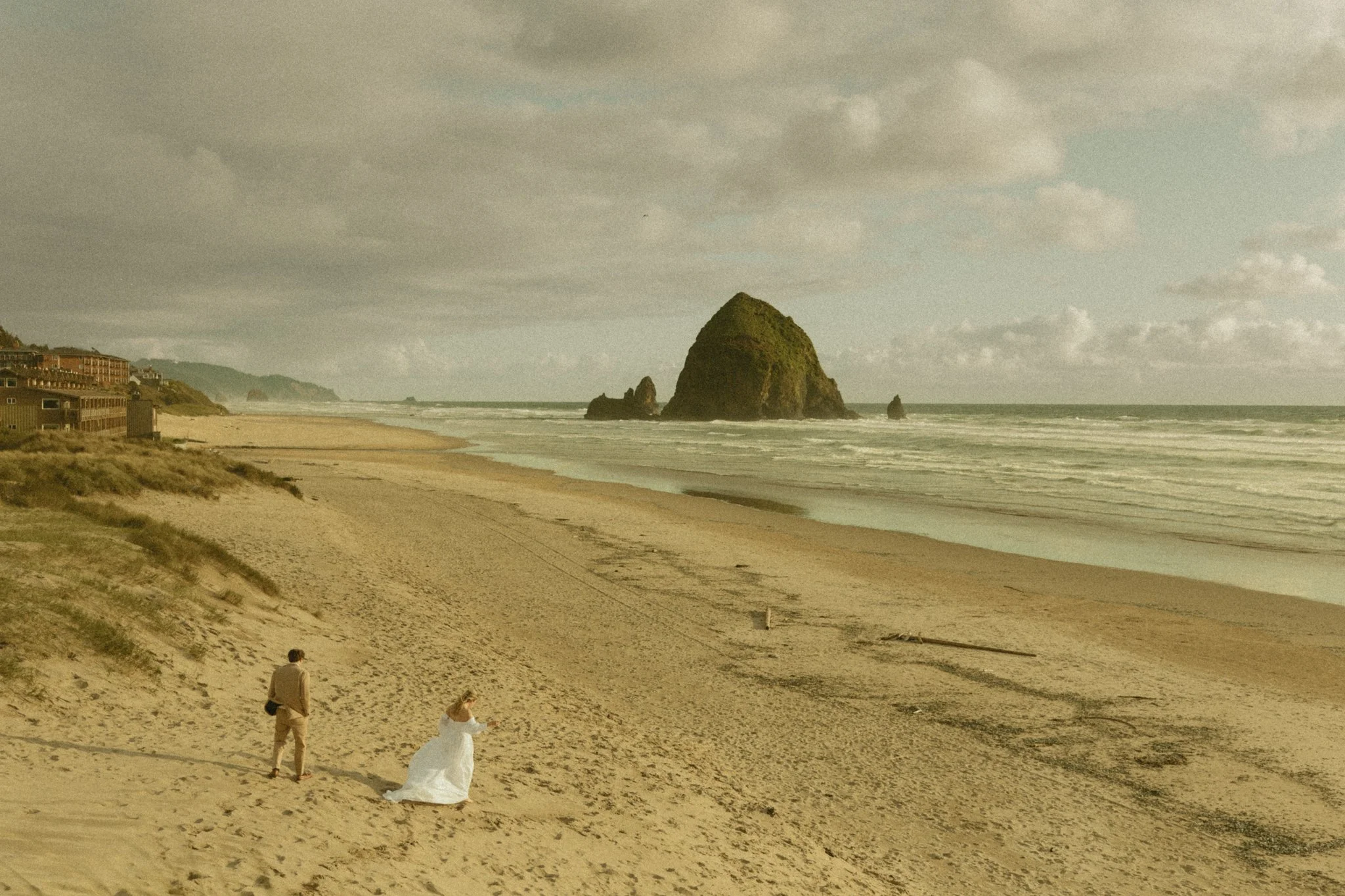 couple eloping on Cannon Beach in Oregon