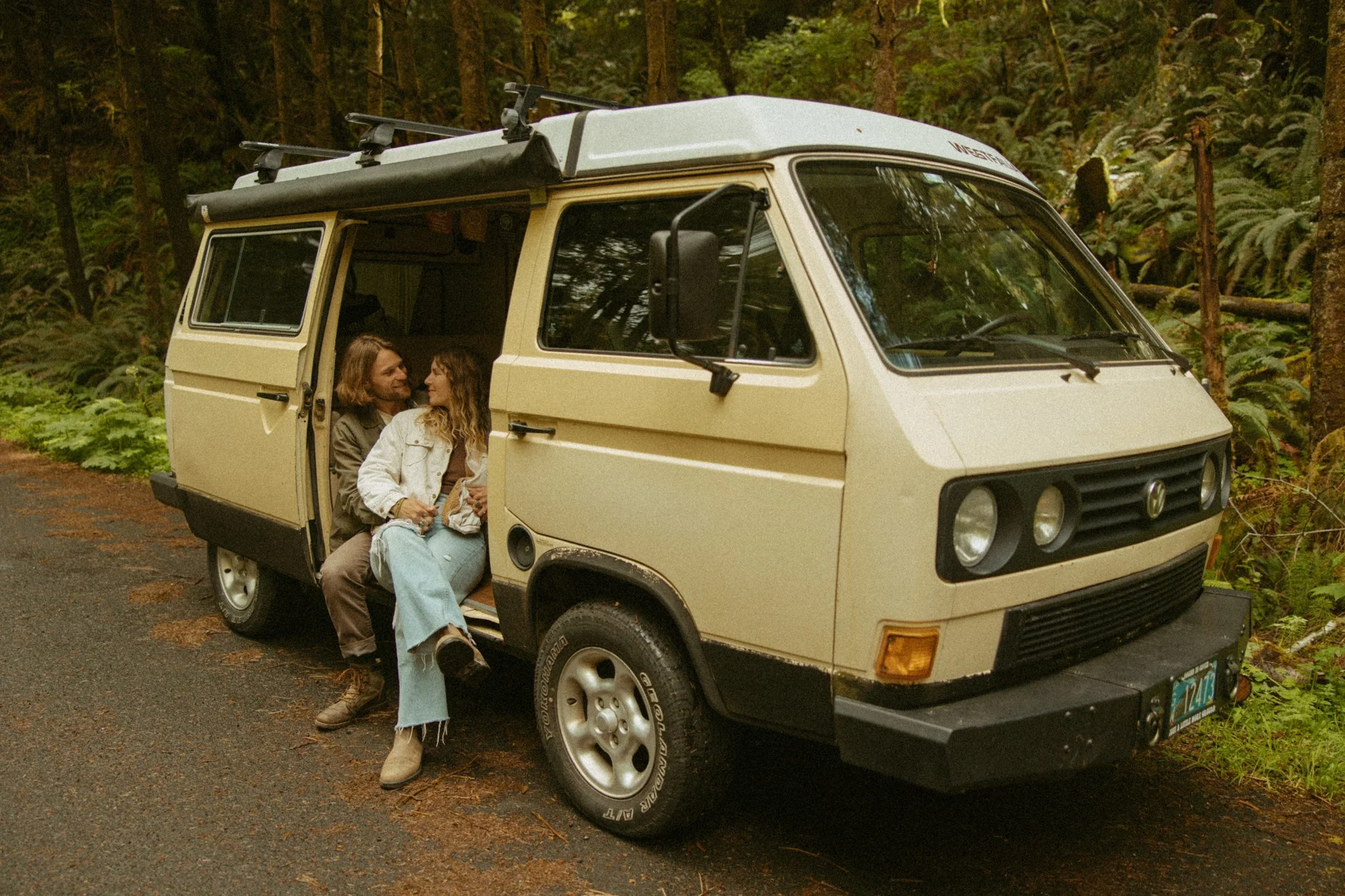 couple relaxing in their camper van before their elopement day starts