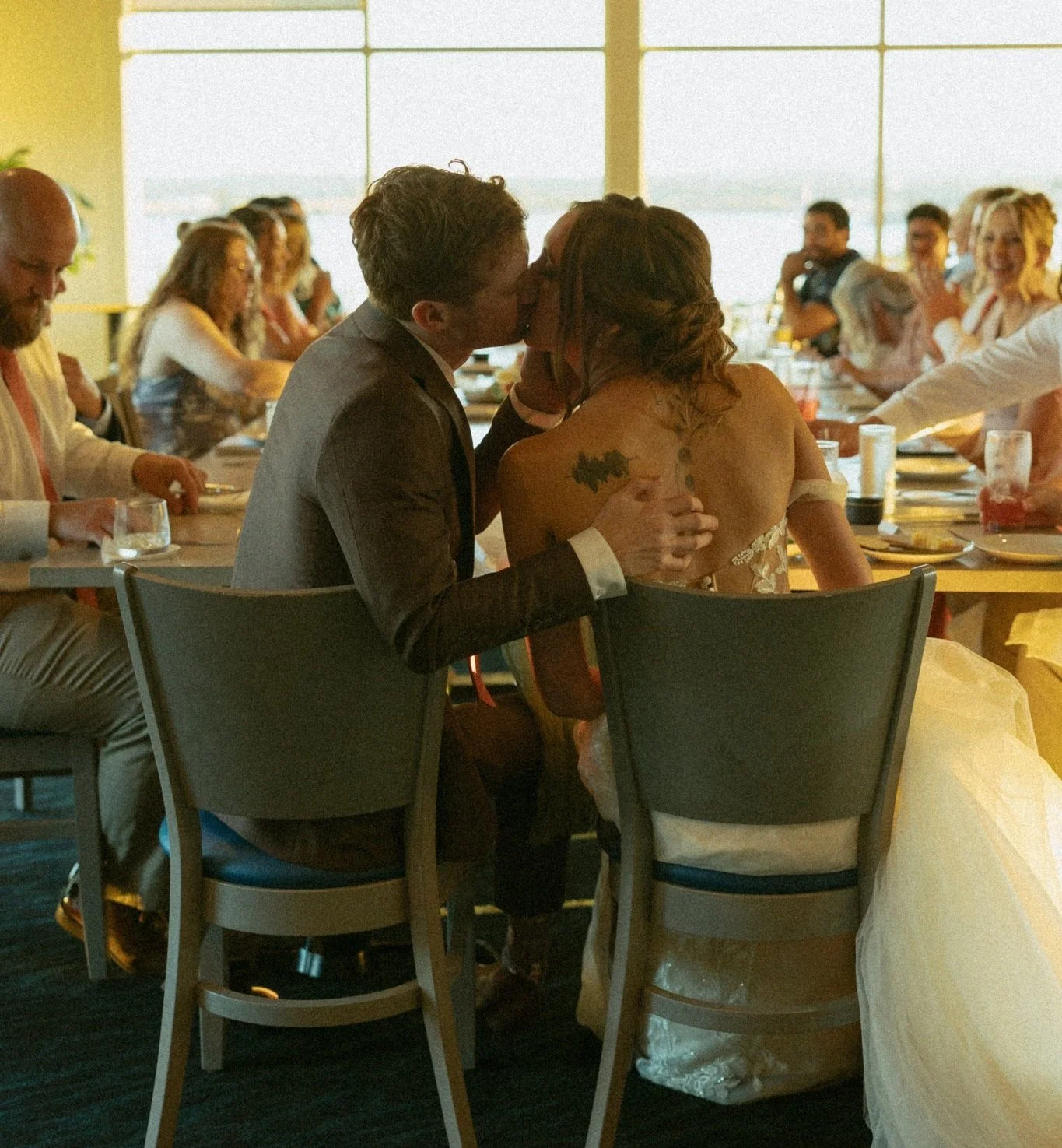 elopement couple celebrating with their family with a dinner after their elopement