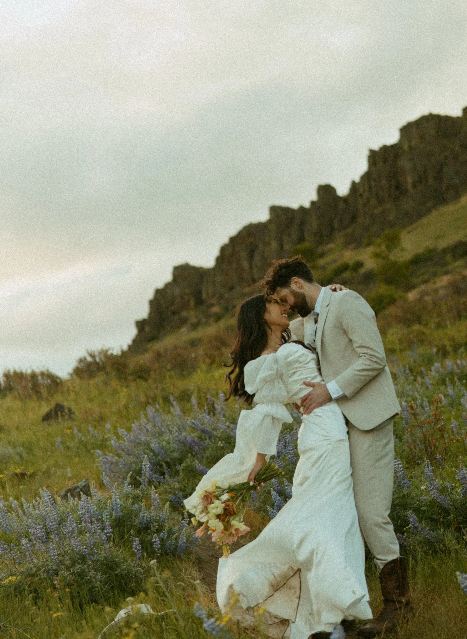 a couple getting married among the wildflowers on the Columbia River Gorge