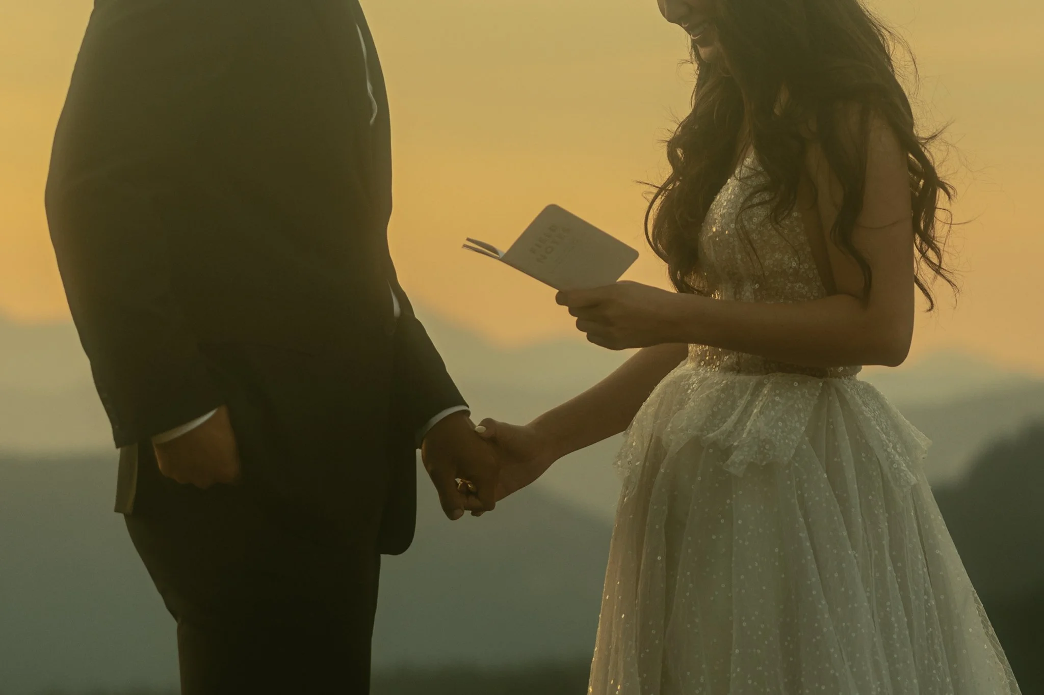 elopement couple reading vows