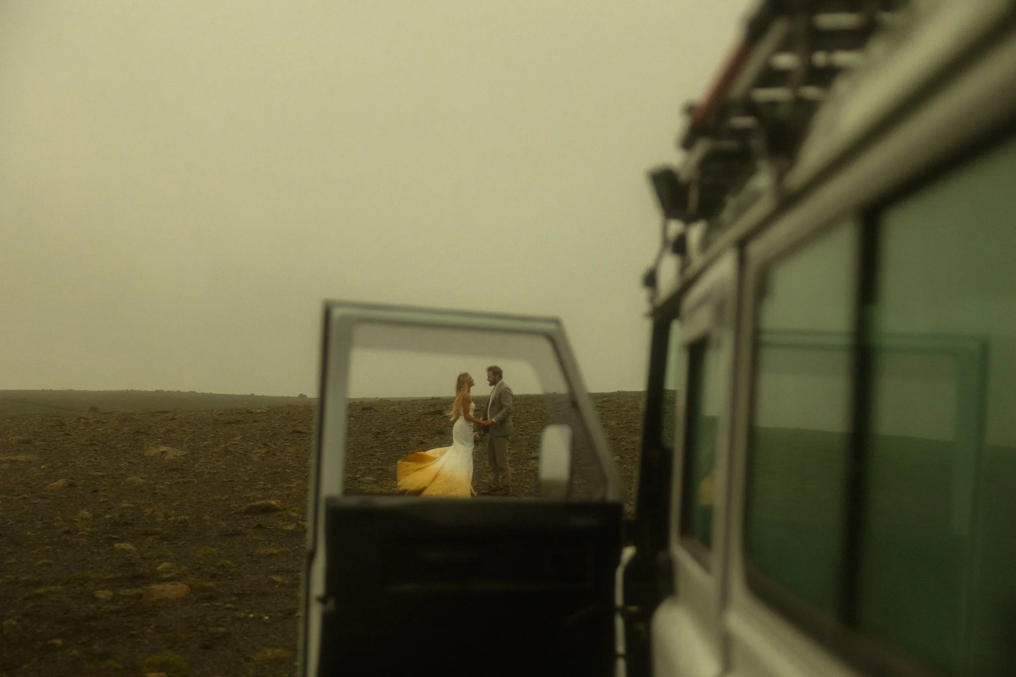 an elopement couple taking a Defender tour through the highlands in Iceland