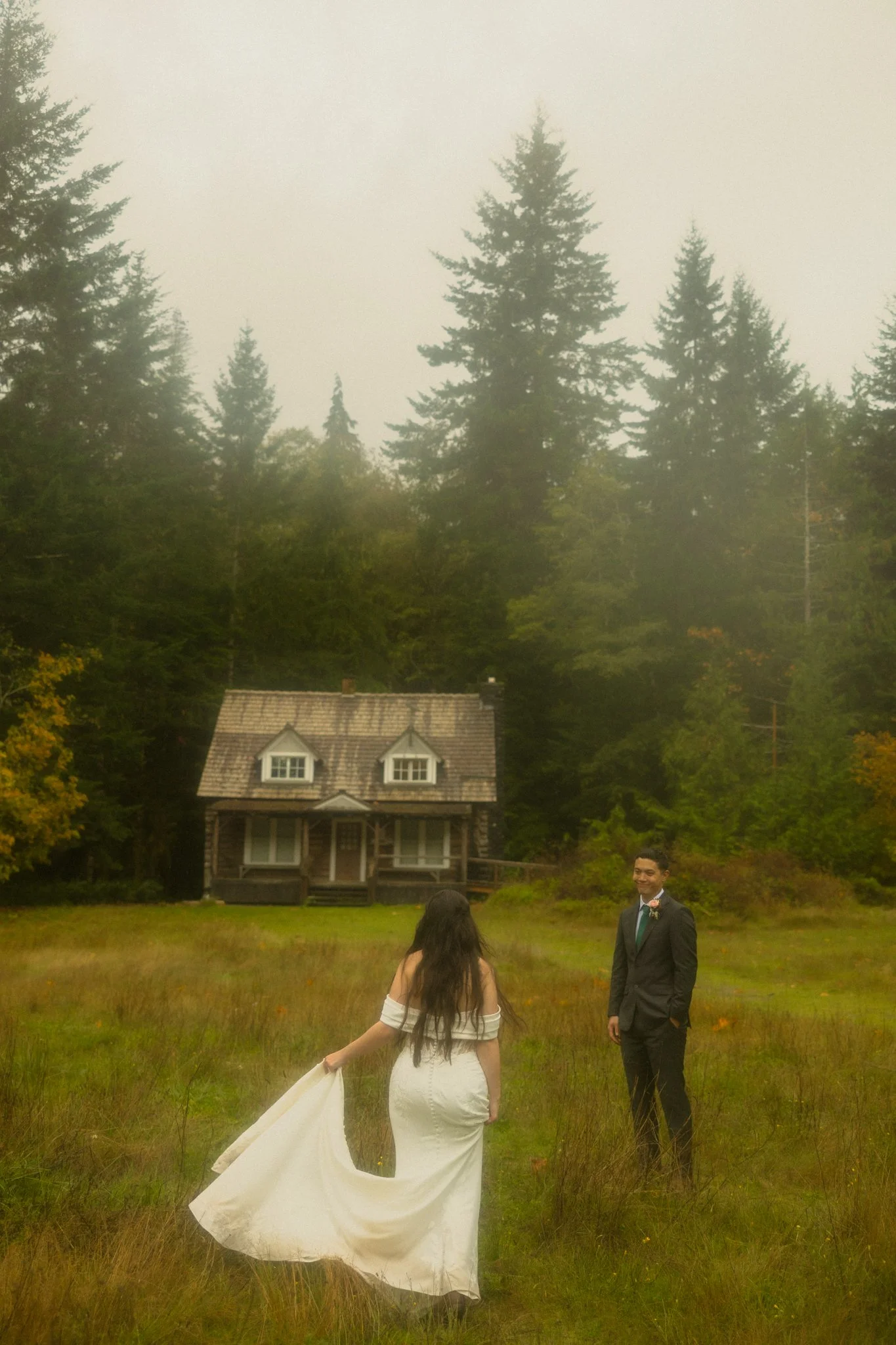 an elopement couple getting married in Olympic National Park on a rainy fall day 