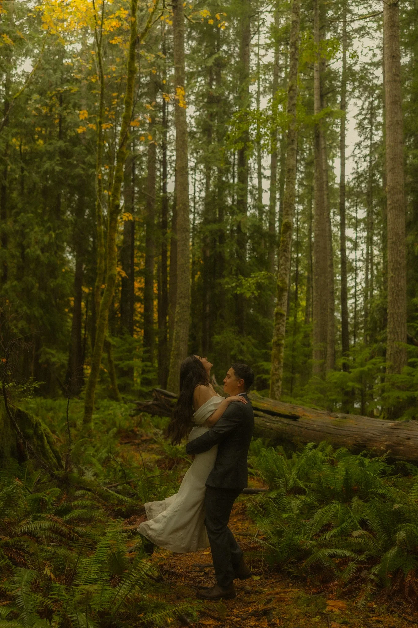  an elopement couple getting married in Olympic National Park on a rainy fall day 