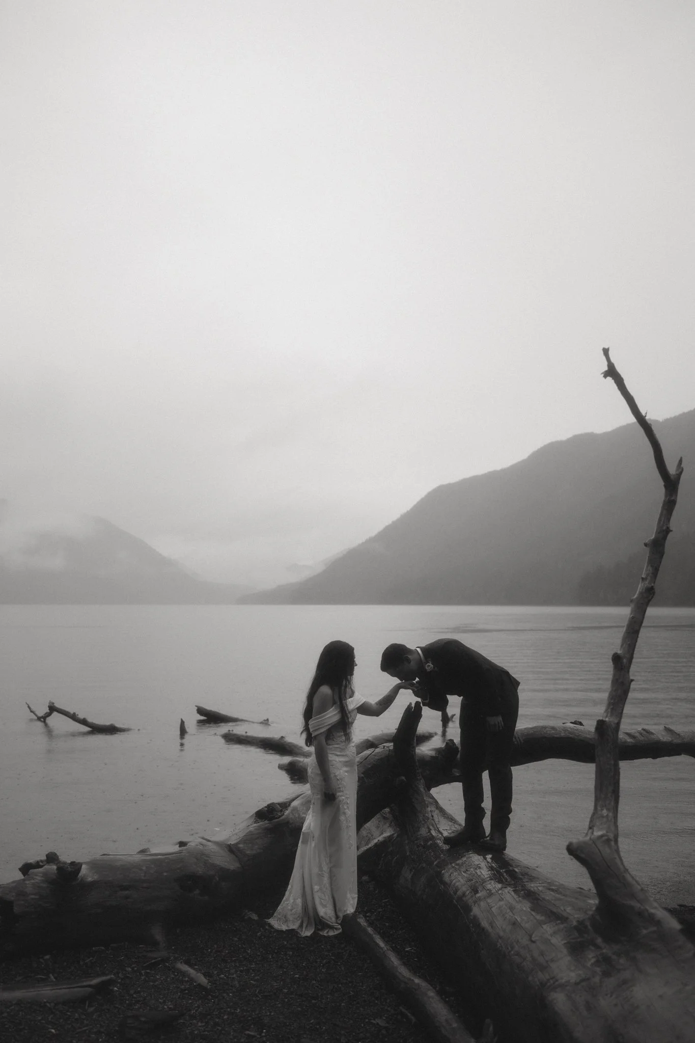  an elopement couple getting married in Olympic National Park on a rainy fall day 