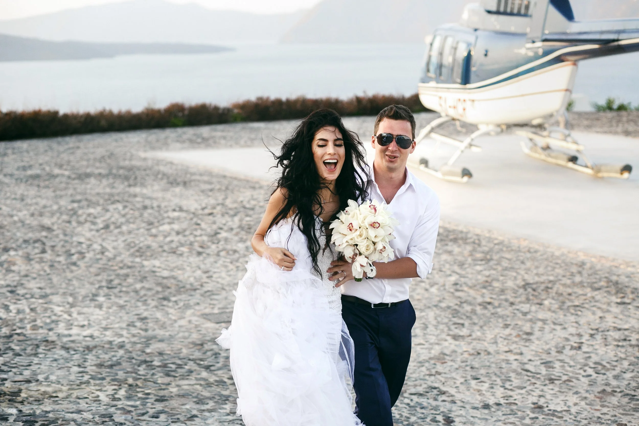 elopement couple getting off helicopter