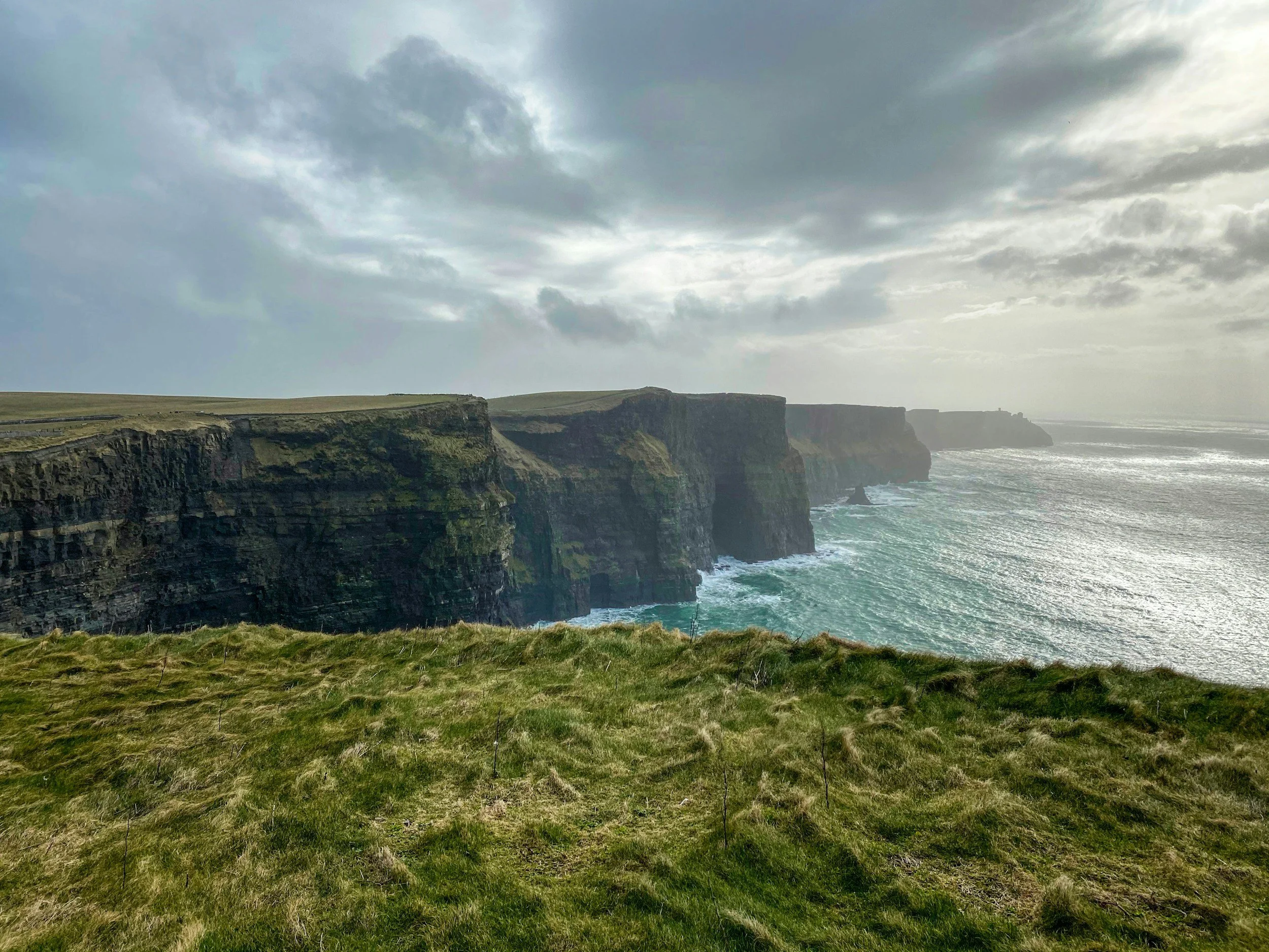 a landscape photo of the Cliffs of Moher in Ireland