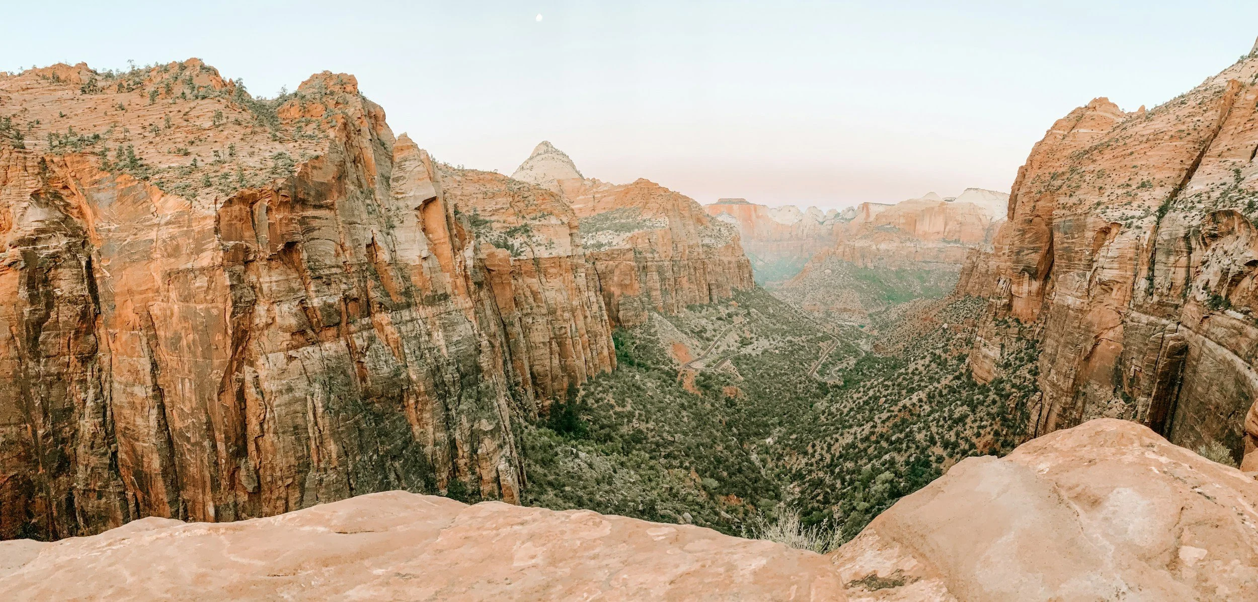a landscape photo of a canyon in Zion National Park in Utah