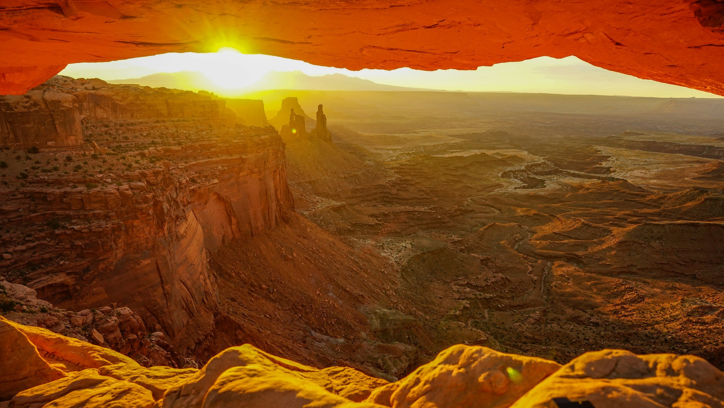 a landscape photo at Mesa Arch in Canyonlands National Park in Utah