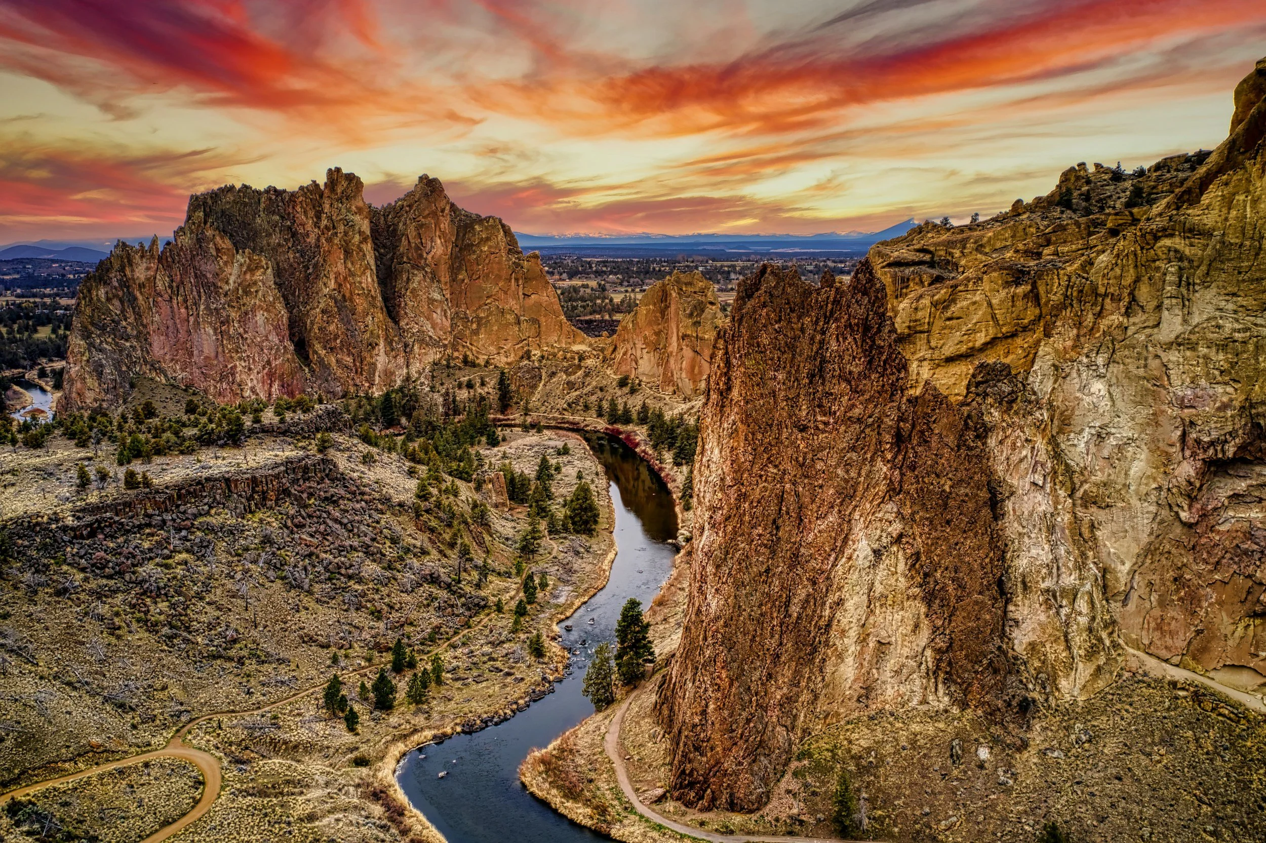 a landscape photo of Smith Rock State Park at sunset in Oregon