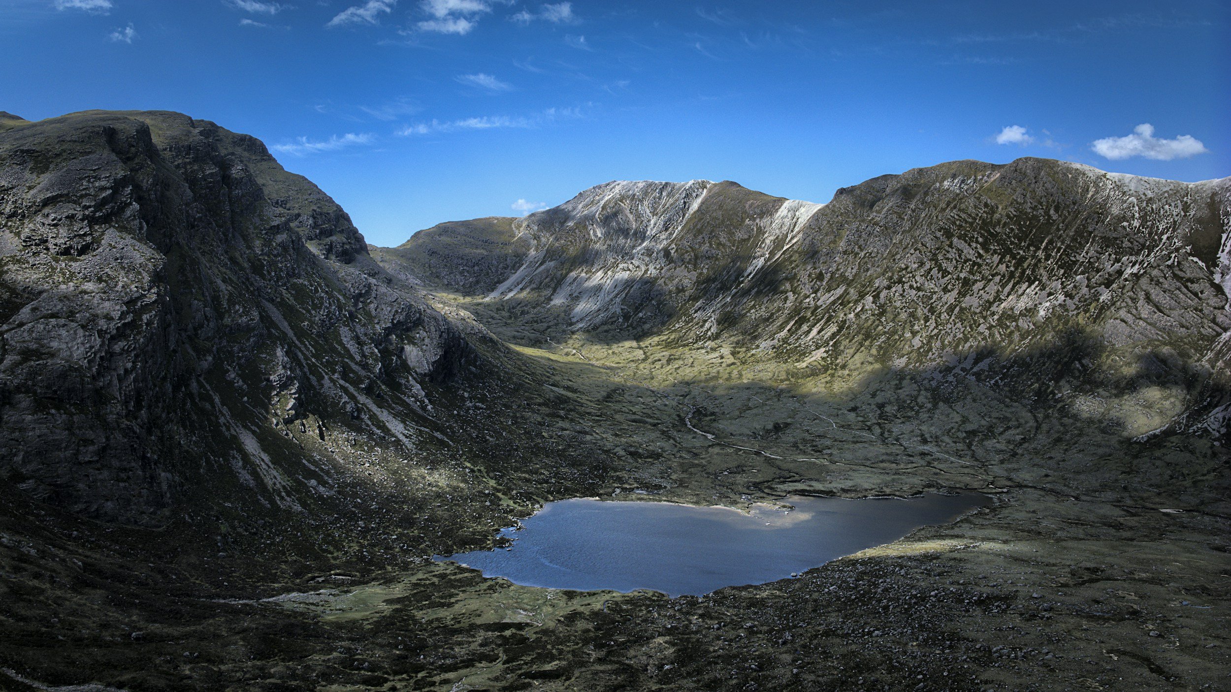 a landscape photo of the mountains in Torridon, Scotland