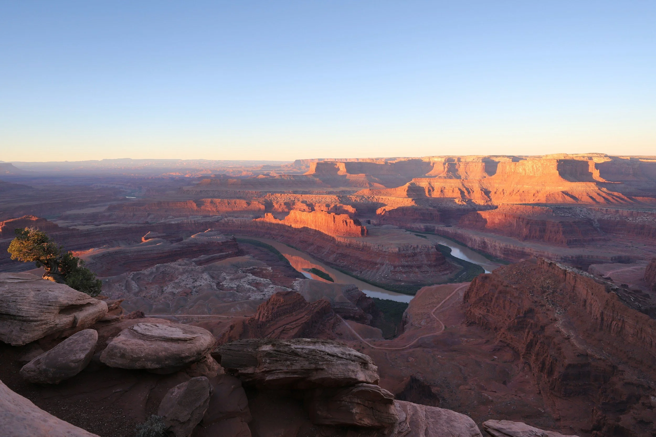 a landscape photo of Dead Horse Point State Park in Moab, Utah at sunrise