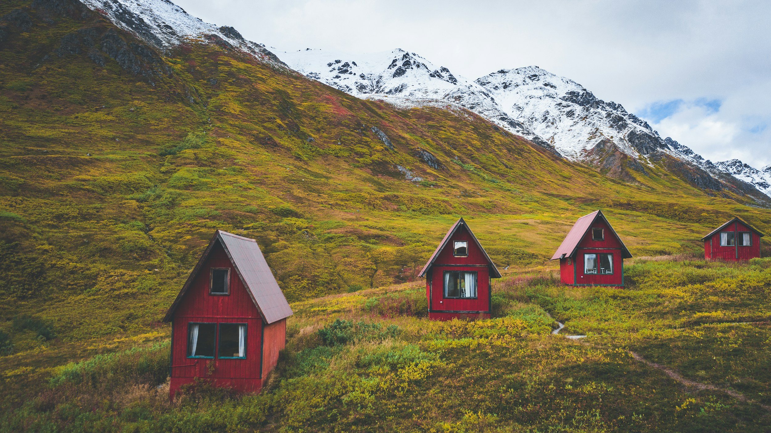 a photo of the little red lodges in Hatcher Pass, Alaska