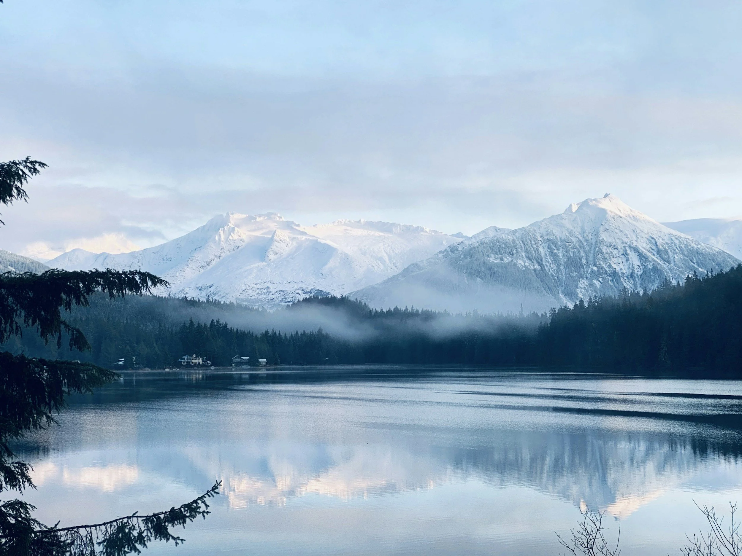 a landscape photo of the mountains in Juneau, Alaska