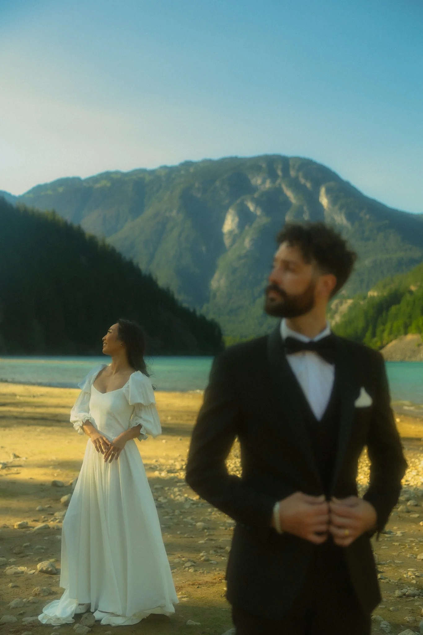  a couple getting married along an alpine lake in the North Cascades then soaking in a natural hot springs 