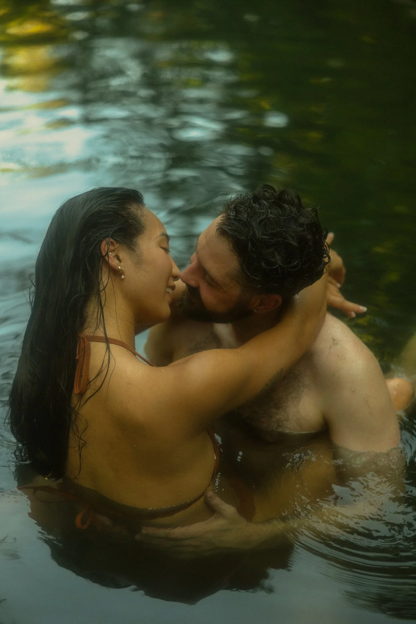  a couple getting married along an alpine lake in the North Cascades then soaking in a natural hot springs 