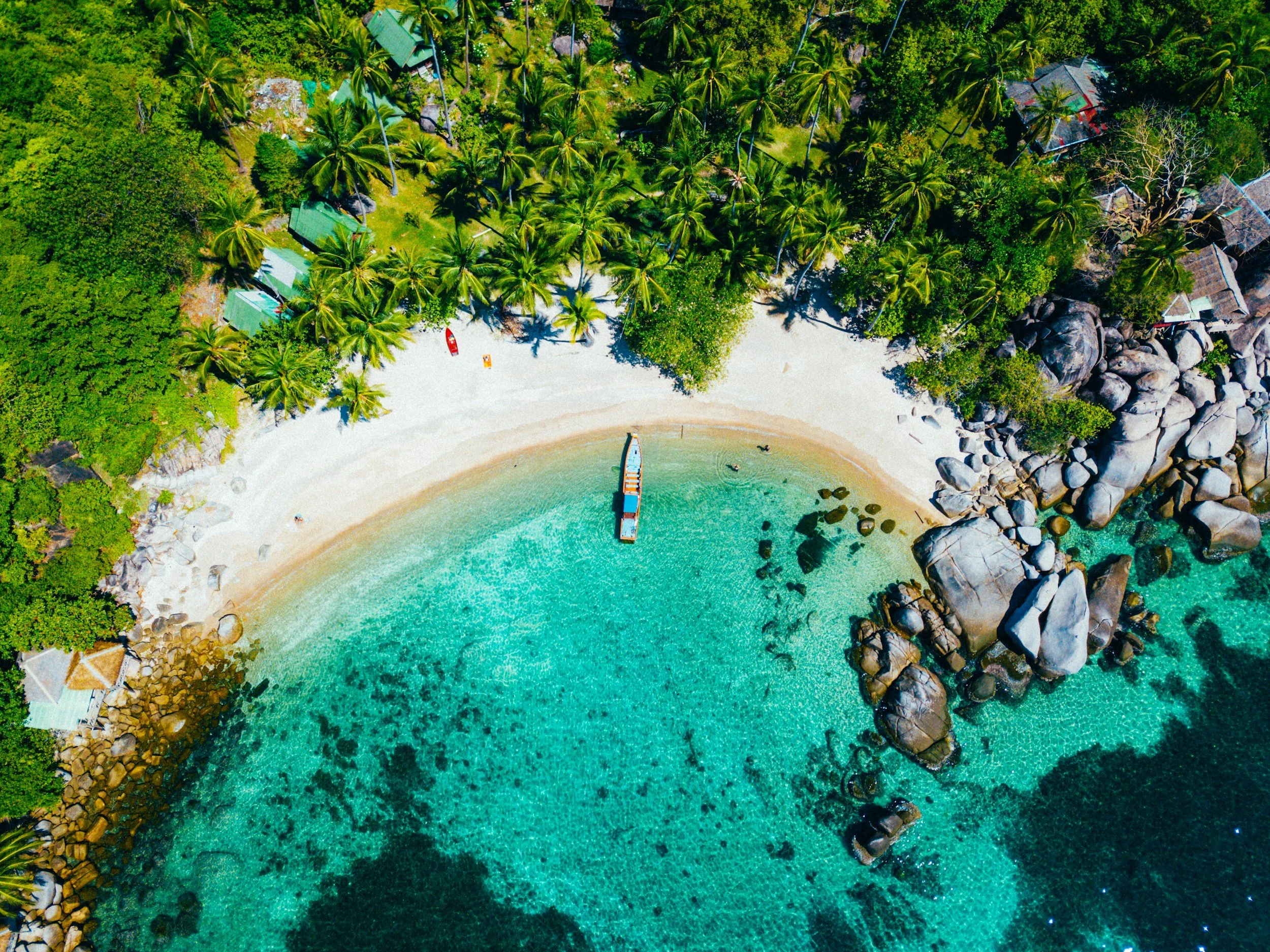 an aerial shot of a beach on Koh Samui, Thailand