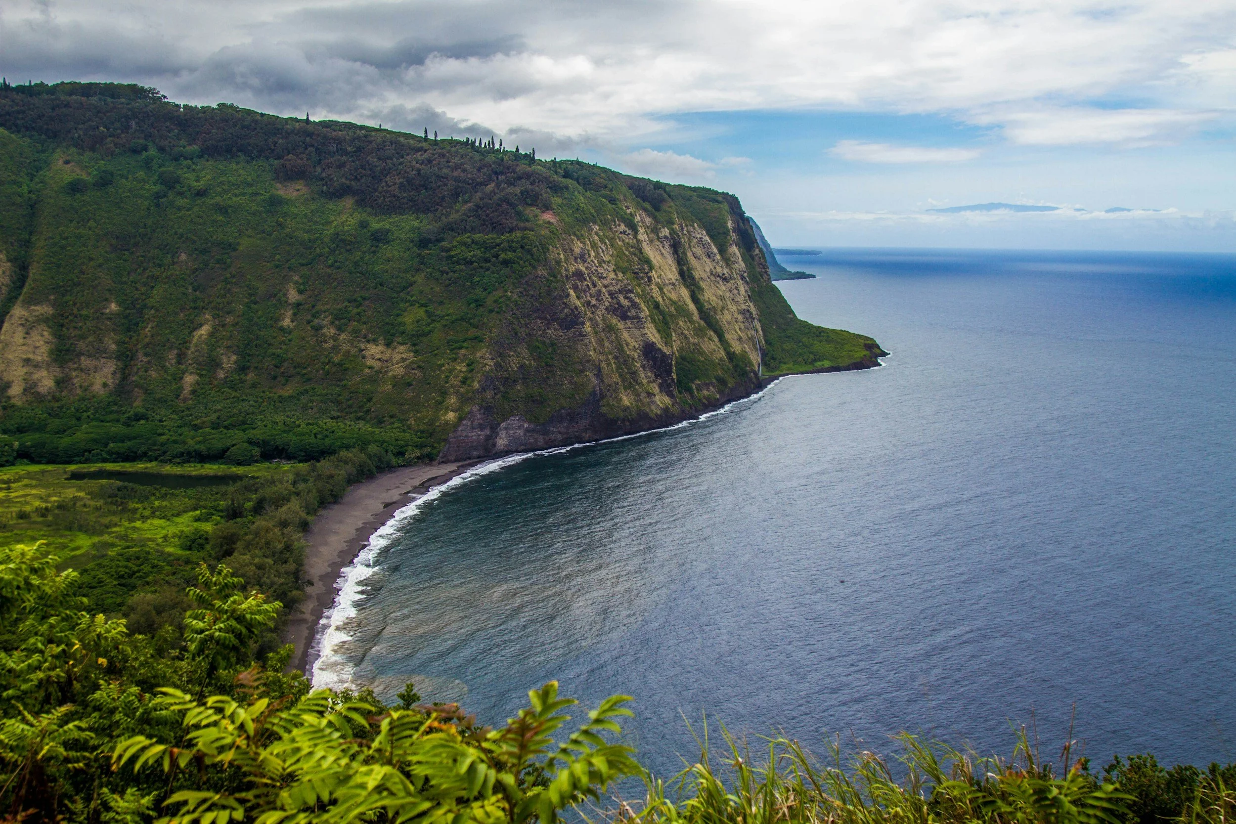 a coastal cliffside overlook of Waipio Valley on the Big Island of Hawaii