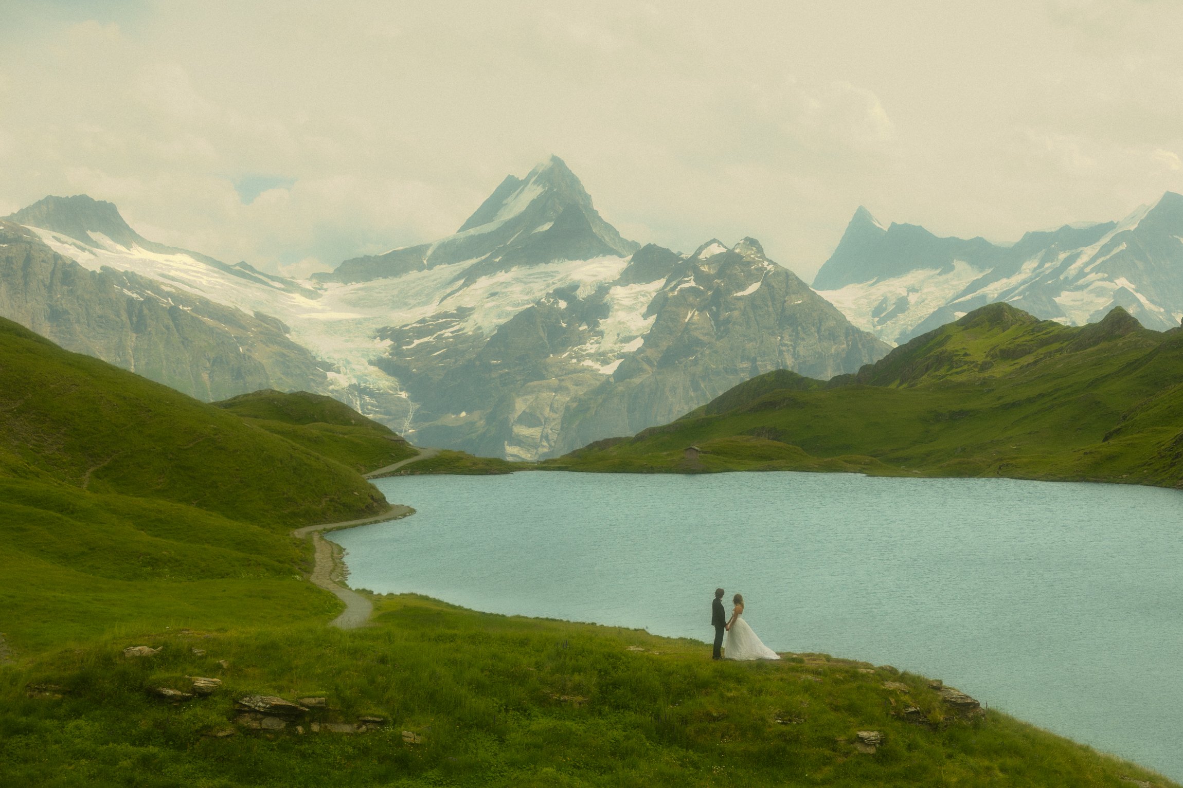 a couple getting married at Lake Bachalpsee in the Swiss Alps