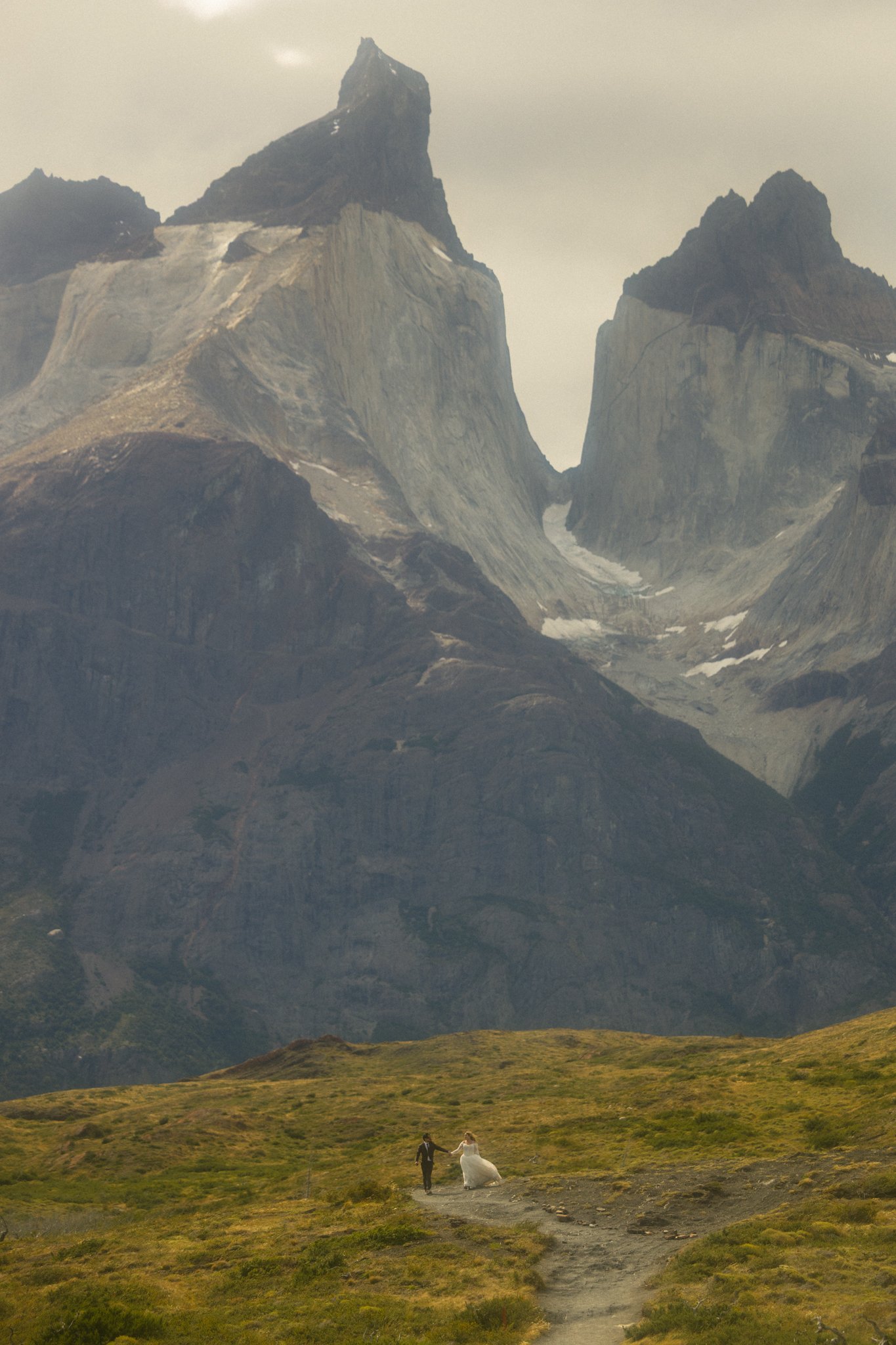 a couple eloping along Lago Pehoe in Torres del Paine National Park in the Chile side of Patagonia