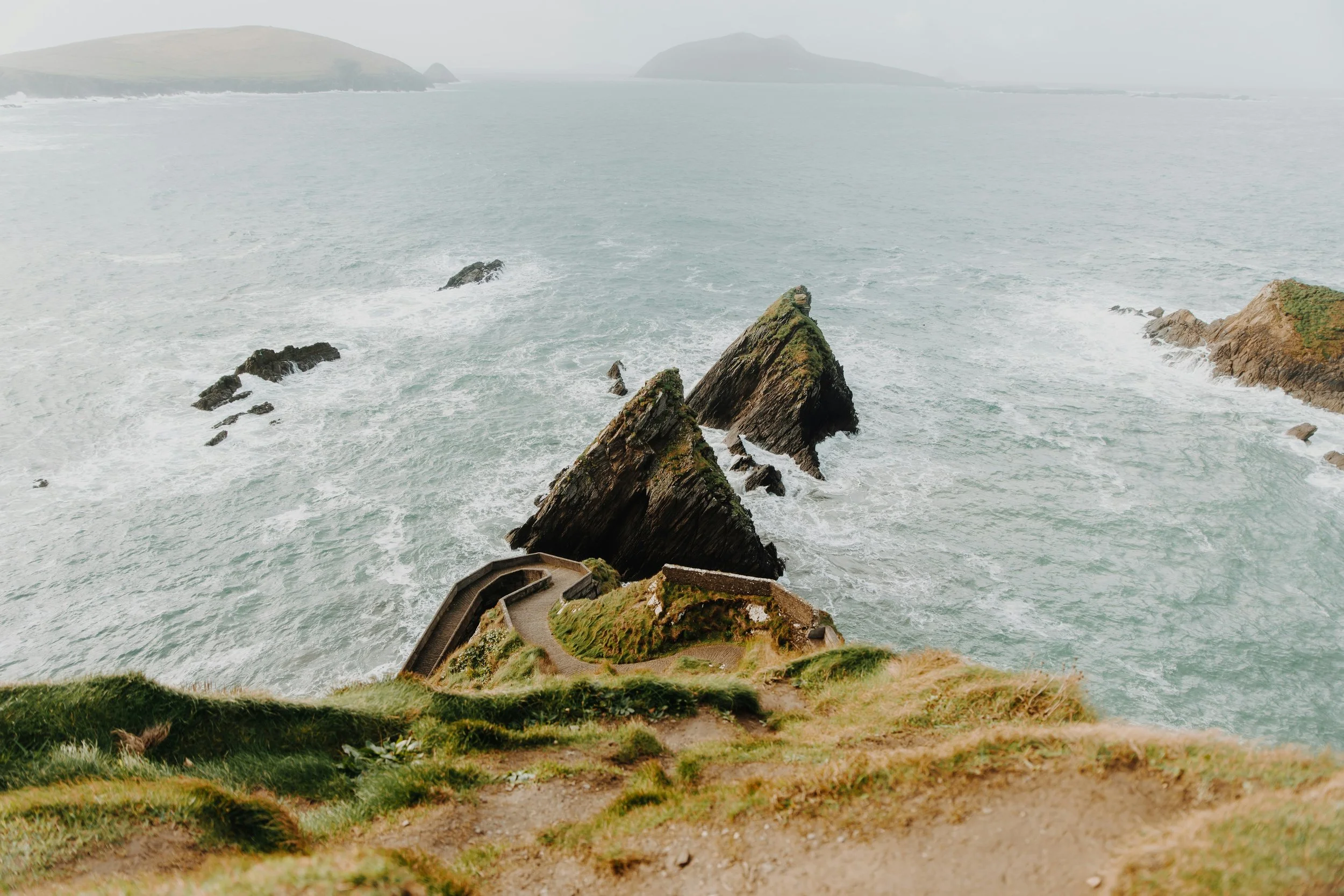 a landscape photo of the coastal Dingle Peninsula in Ireland