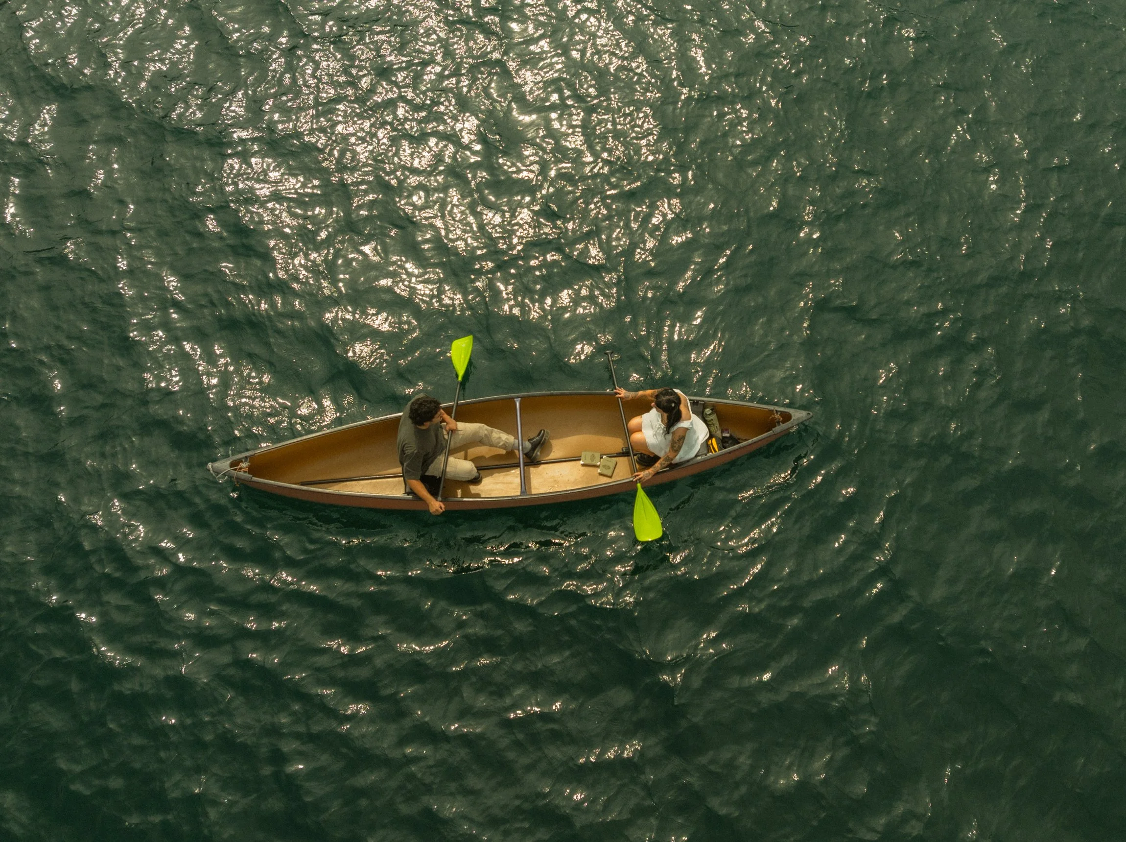 a couple in a canoe on a lake near Olympic National Park