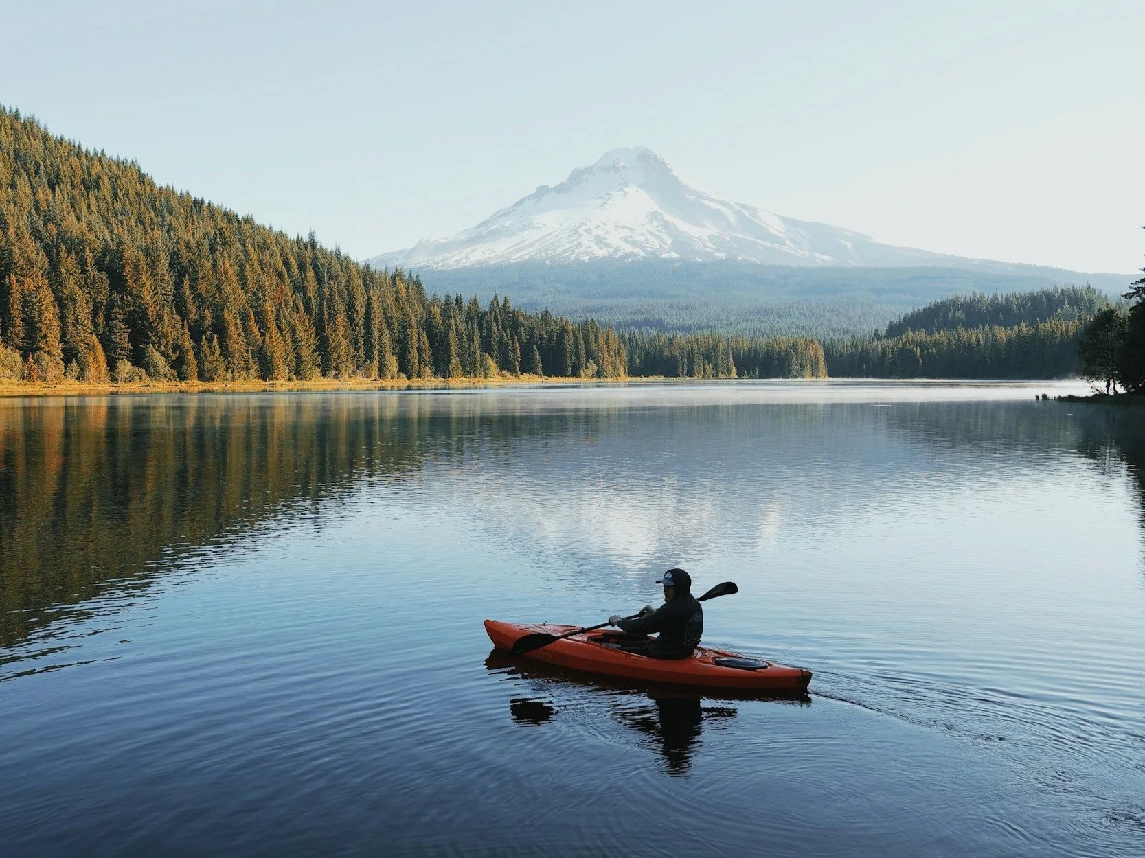 kayaking on a lake with Mt Hood in the background