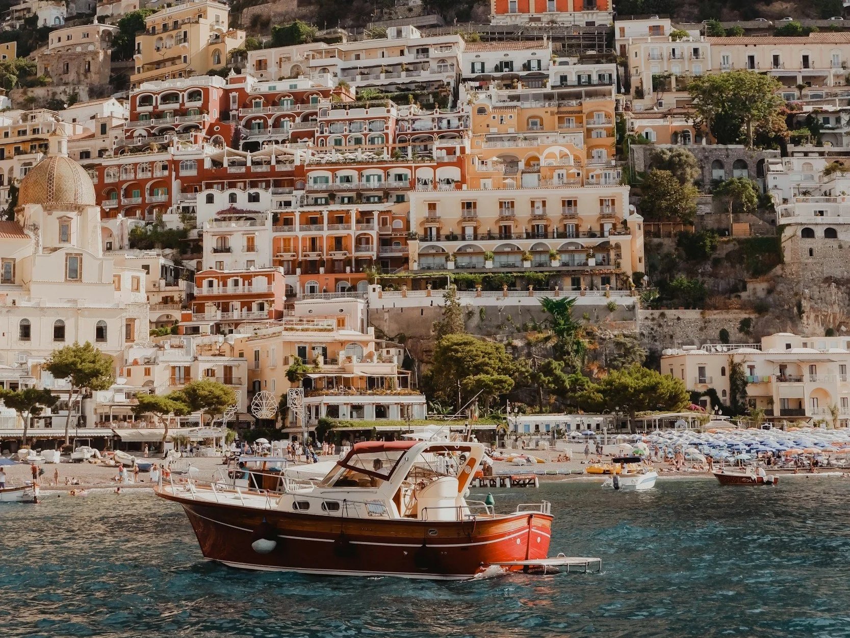 a boat docked on a beach along the Amalfi Coast