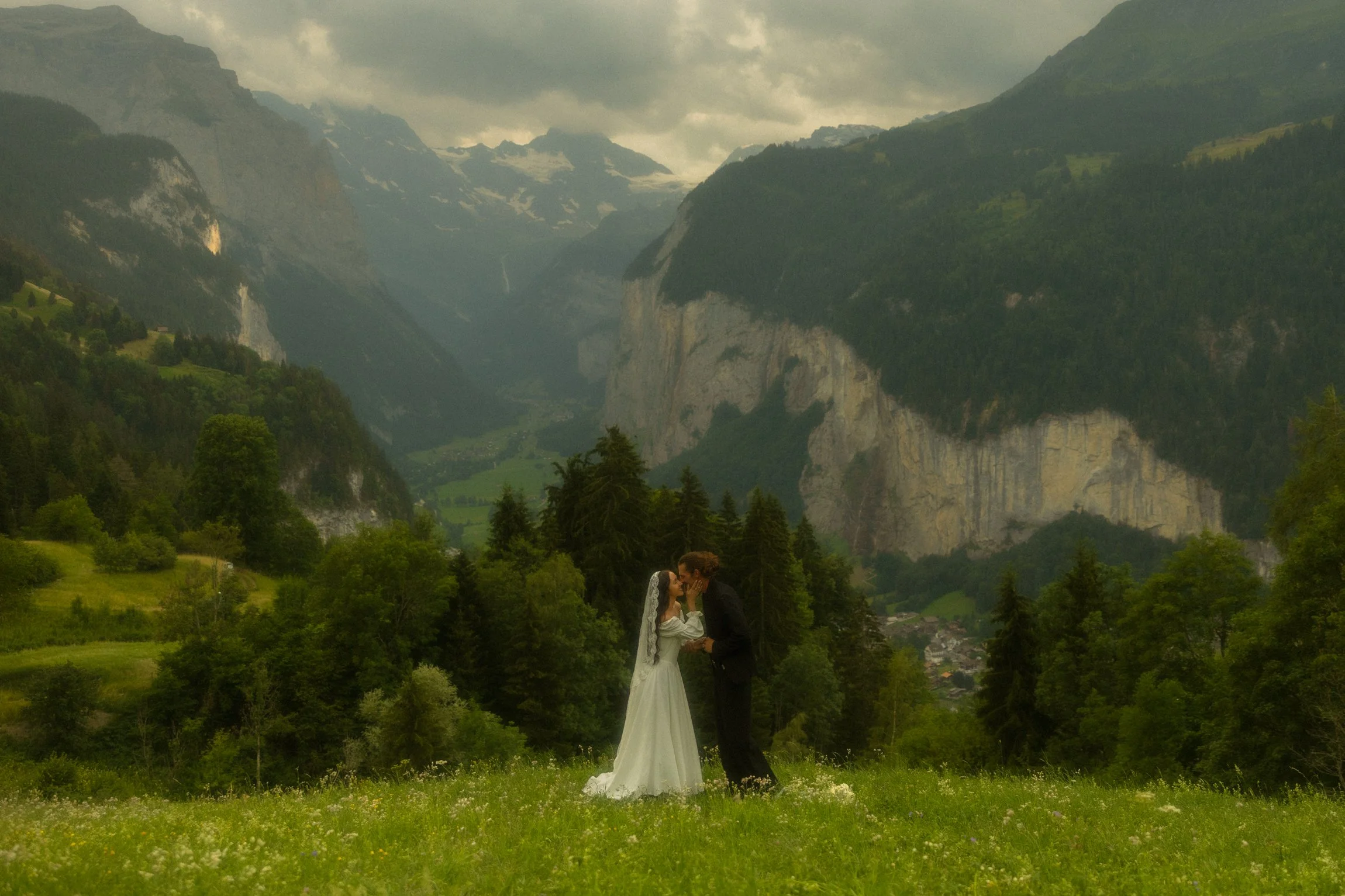 a couple getting married in the Swiss Alps overlooking the Lauterbrunnen Valley