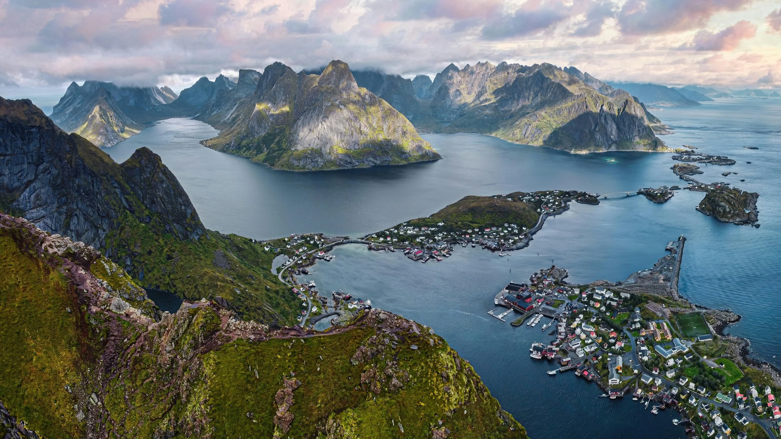 a cliffside view of the fjords and mountains in Lofoten, Norway