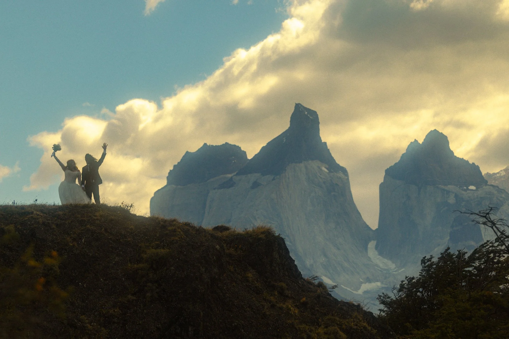a couple eloping along Lago Pehoe in Torres del Paine National Park in the Chile side of Patagonia