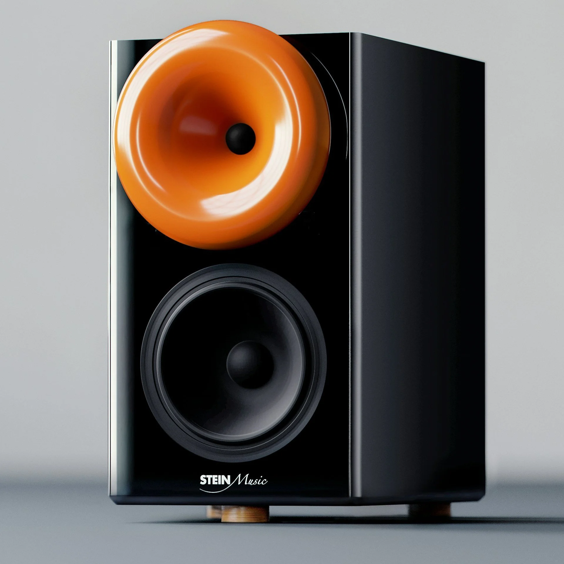 Black Stein Music speaker with orange and black drivers, on a wooden base against a plain background.