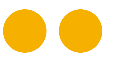 Two orange circles side by side on a black background.