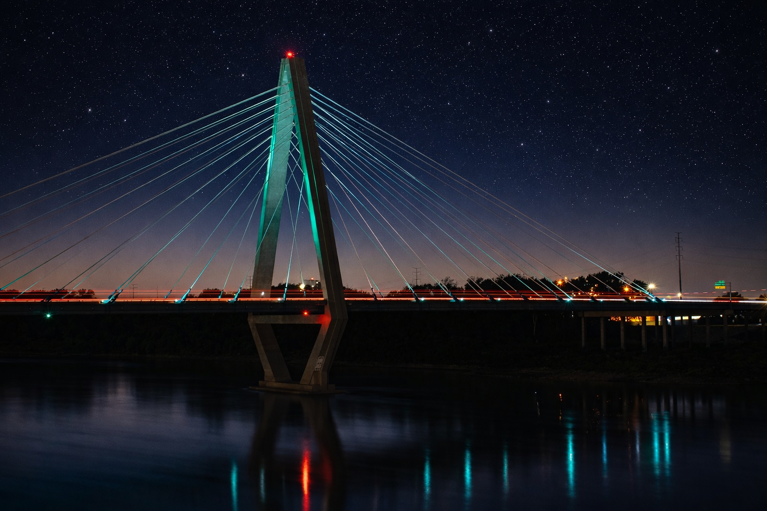 "Lit Quietly"
The bridge holds its light against the darkening sky, steady and contained. What remains doesn’t fade—it glows softly.