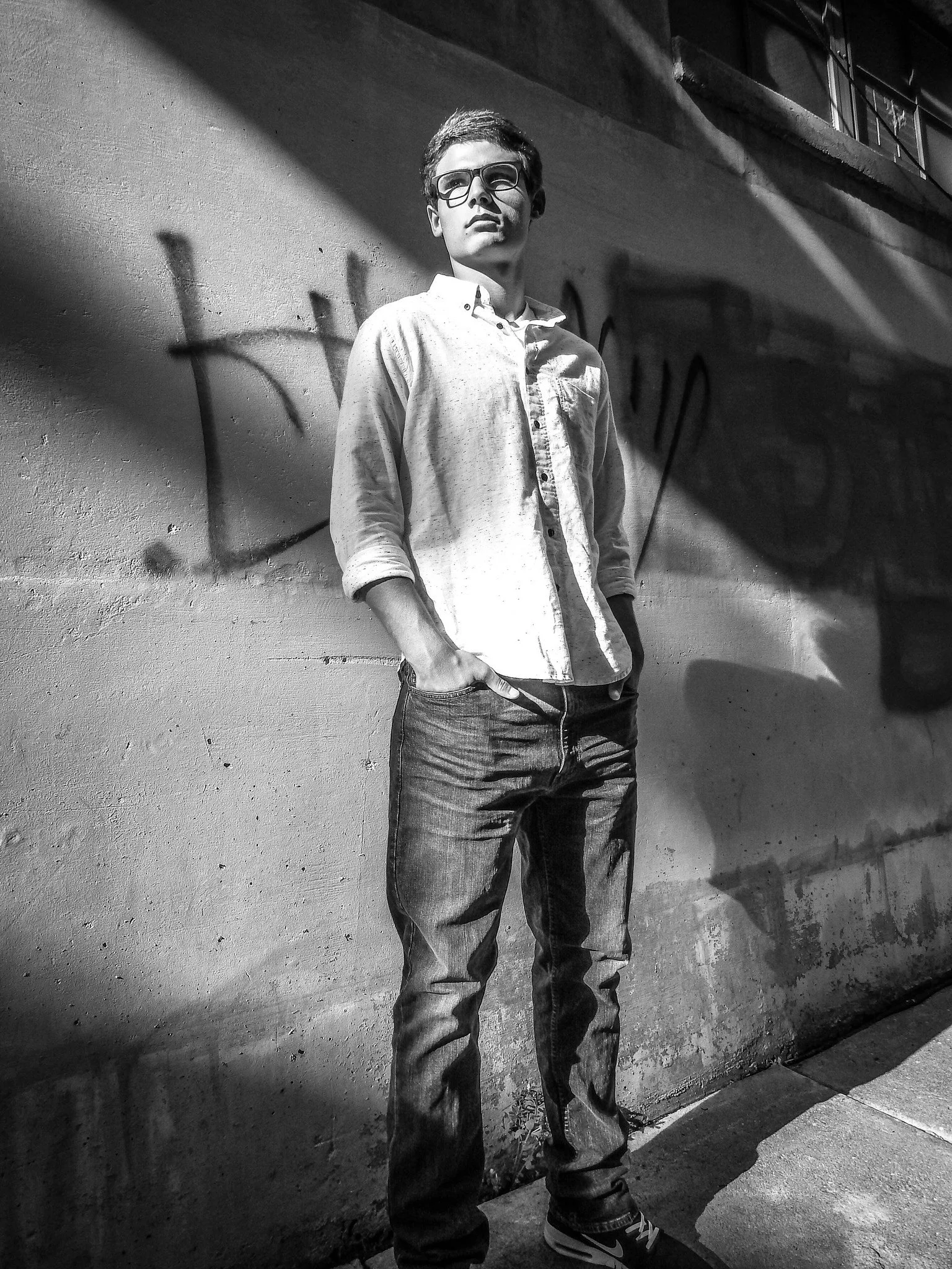 "Uncertain Step"
He moves forward without fully settling into the moment, caught between hesitation and motion. The path is there—but not yet owned.