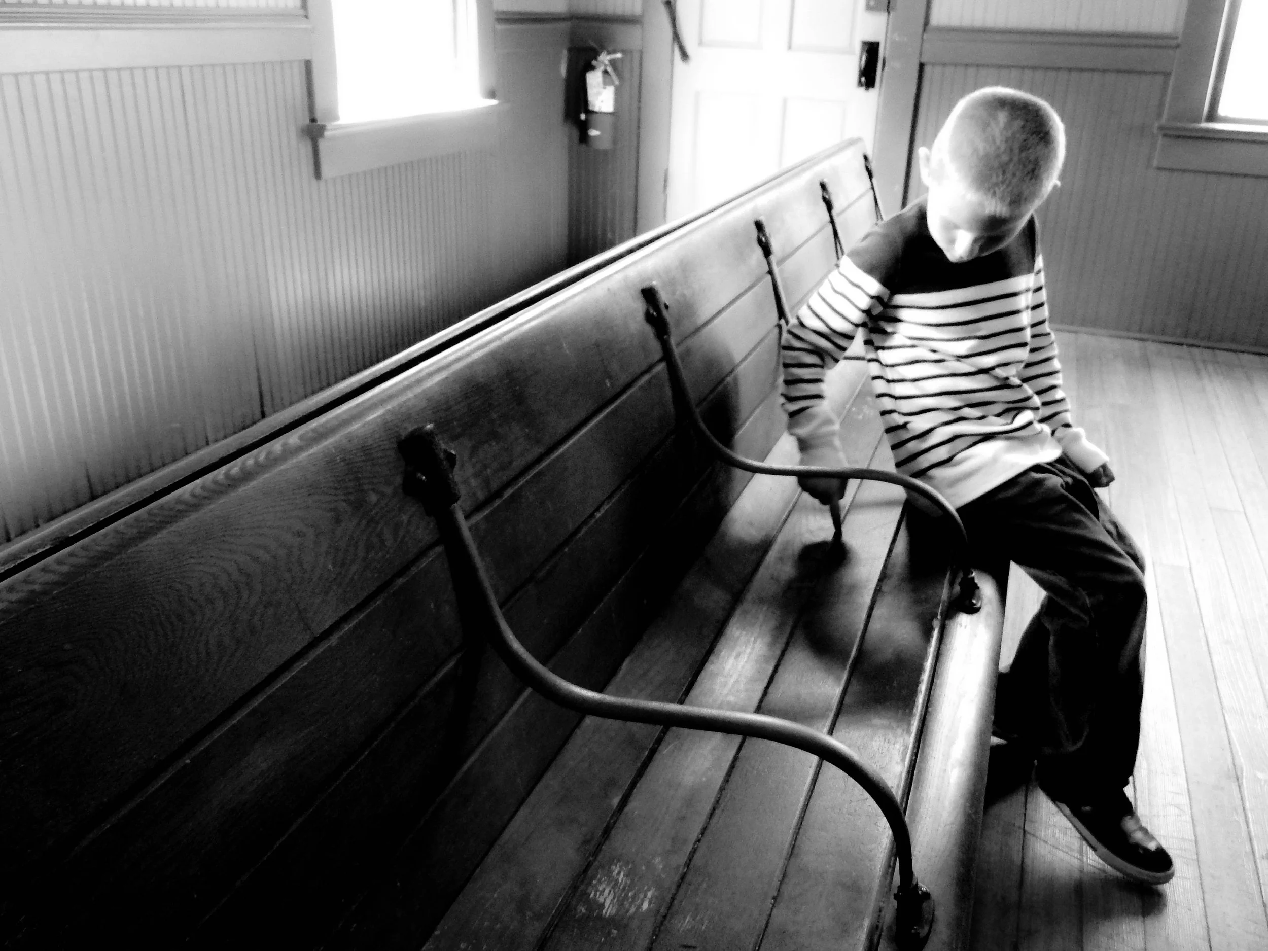 "The Waiting"
He sits with time stretched out beside him, each moment lingering longer than it should. Nothing is happening—but it feels like everything is.