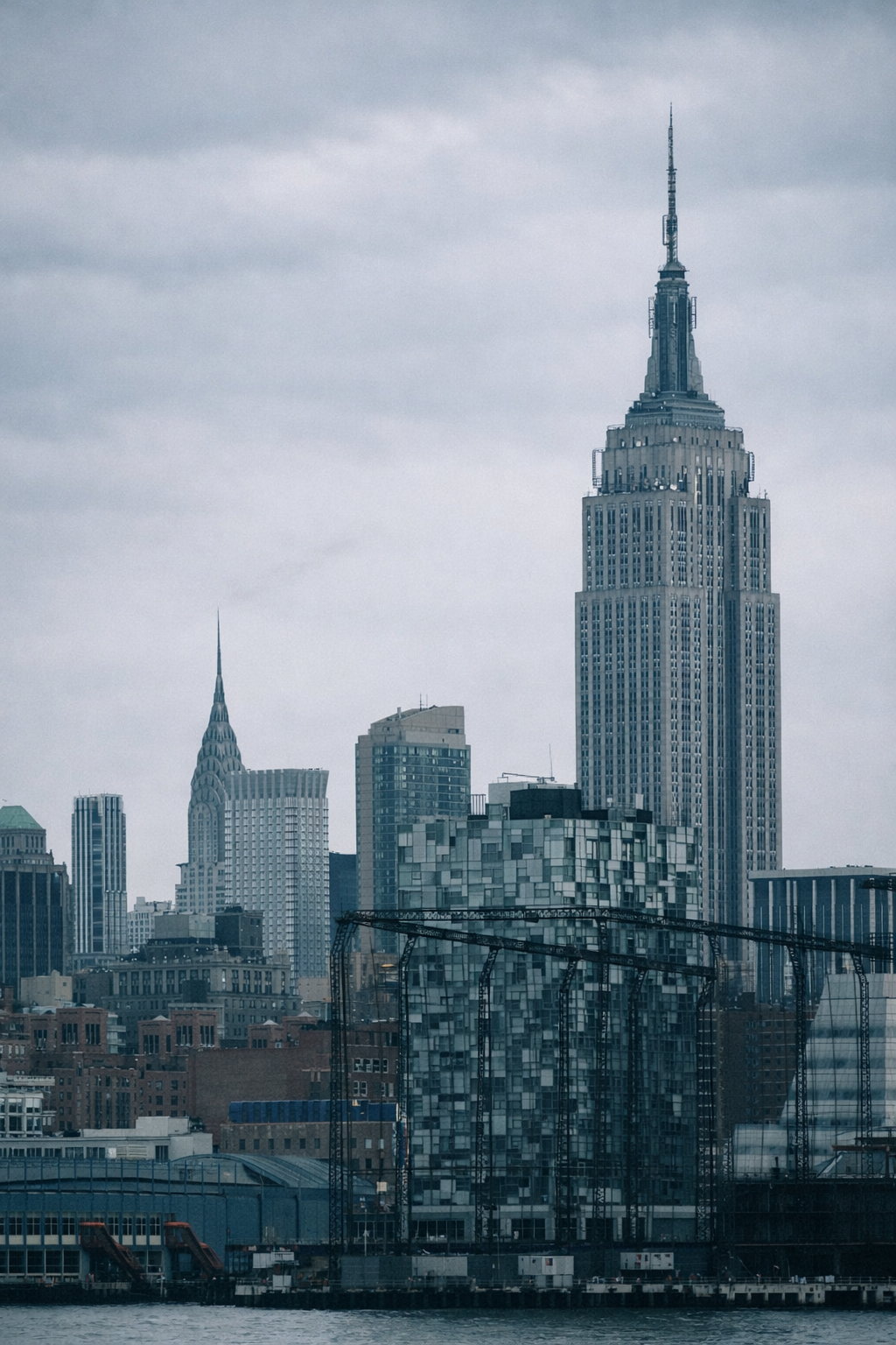 "Above It All"
The skyline layers itself beneath a single point of height. What we build rises—but always in relation to what stands around it.