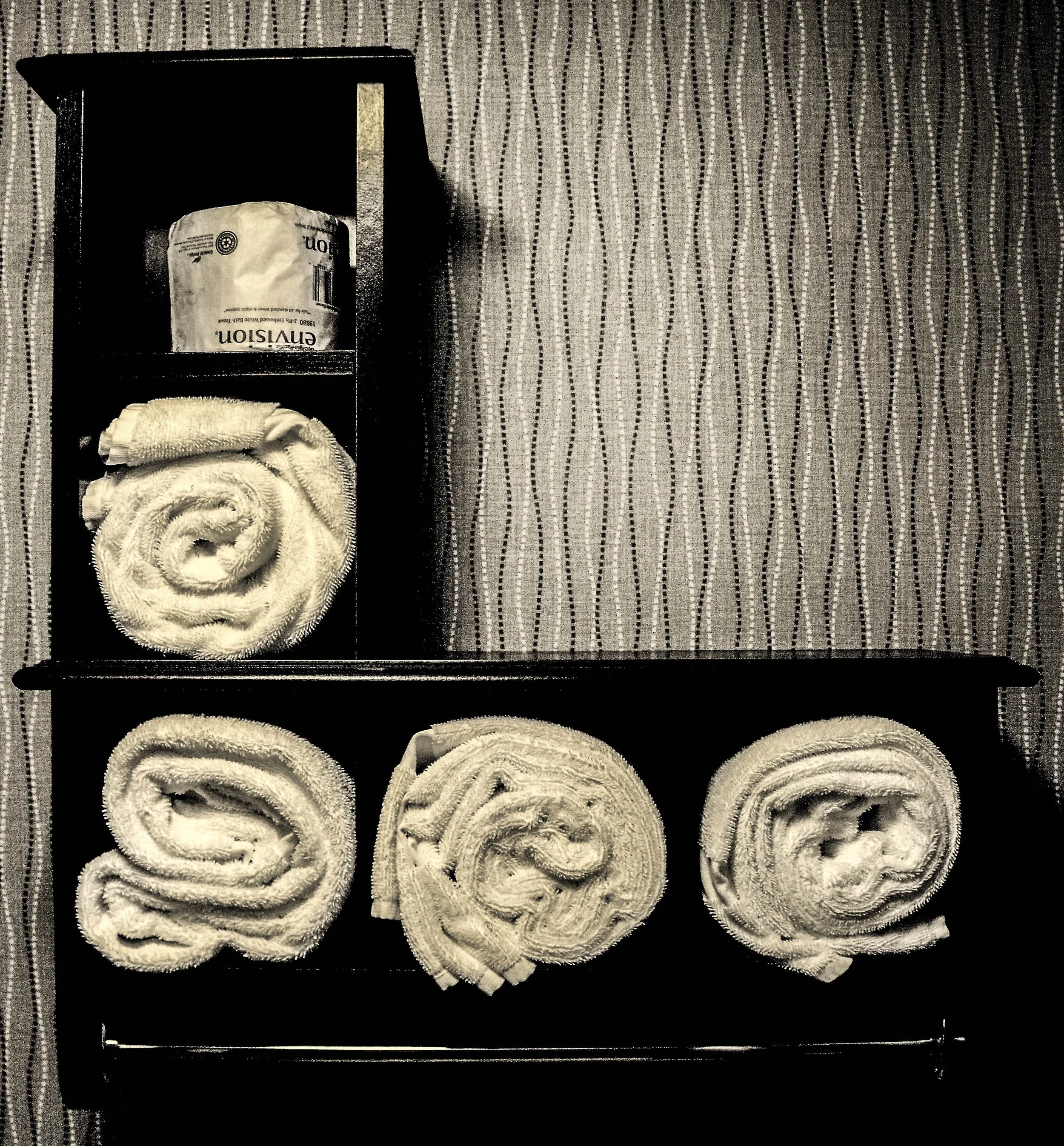 "Before the Call"
Towels are folded, the space prepared, everything in place. The moment holds—waiting for someone to arrive and give it purpose.