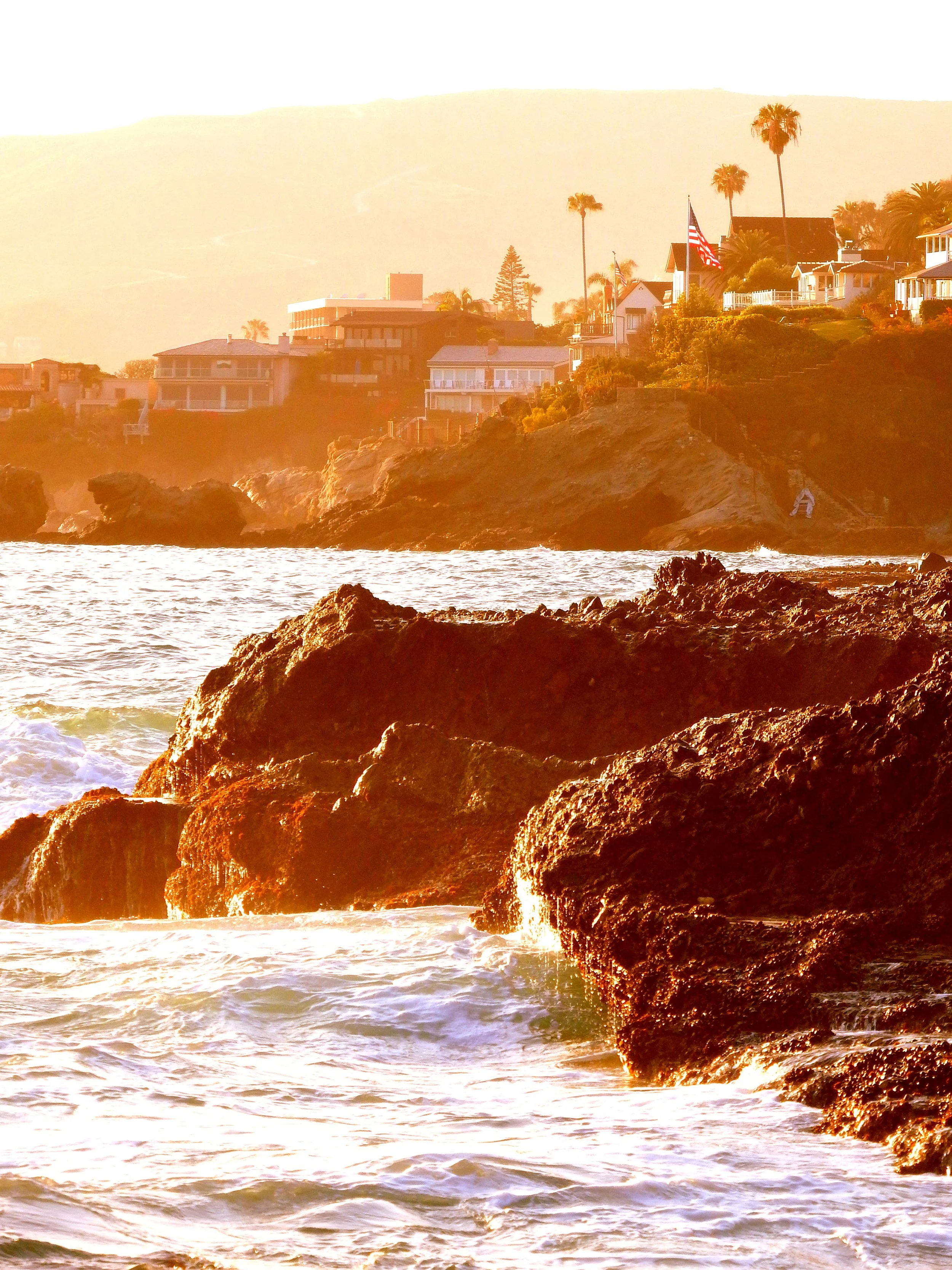 "Clinging Light"
The sun holds to the edges of rock and water, refusing to leave all at once. The day lingers where it can.