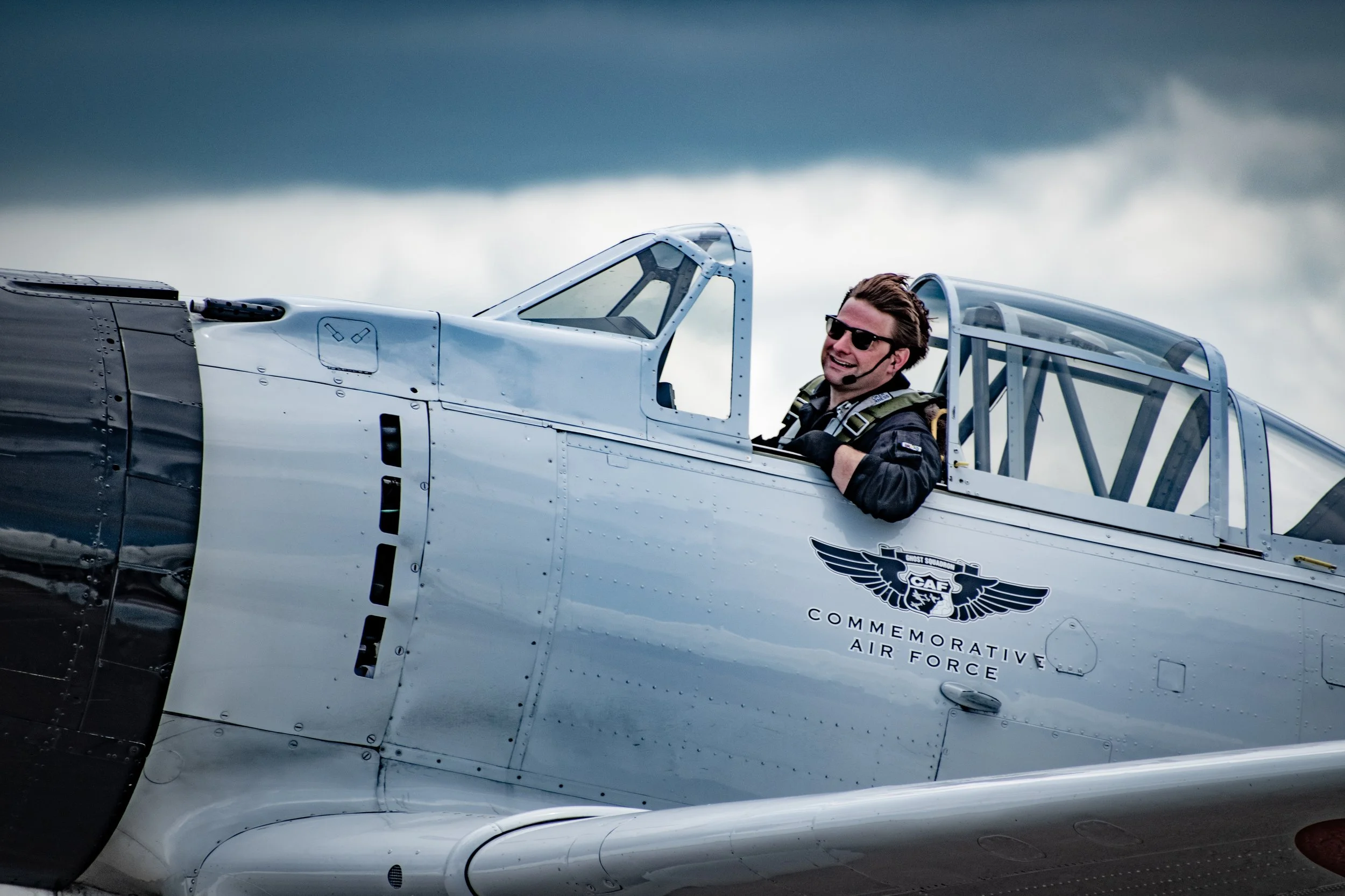 "Ready to Go"
He looks ahead from the cockpit, already somewhere beyond the ground. The moment hasn’t started—but he’s there.