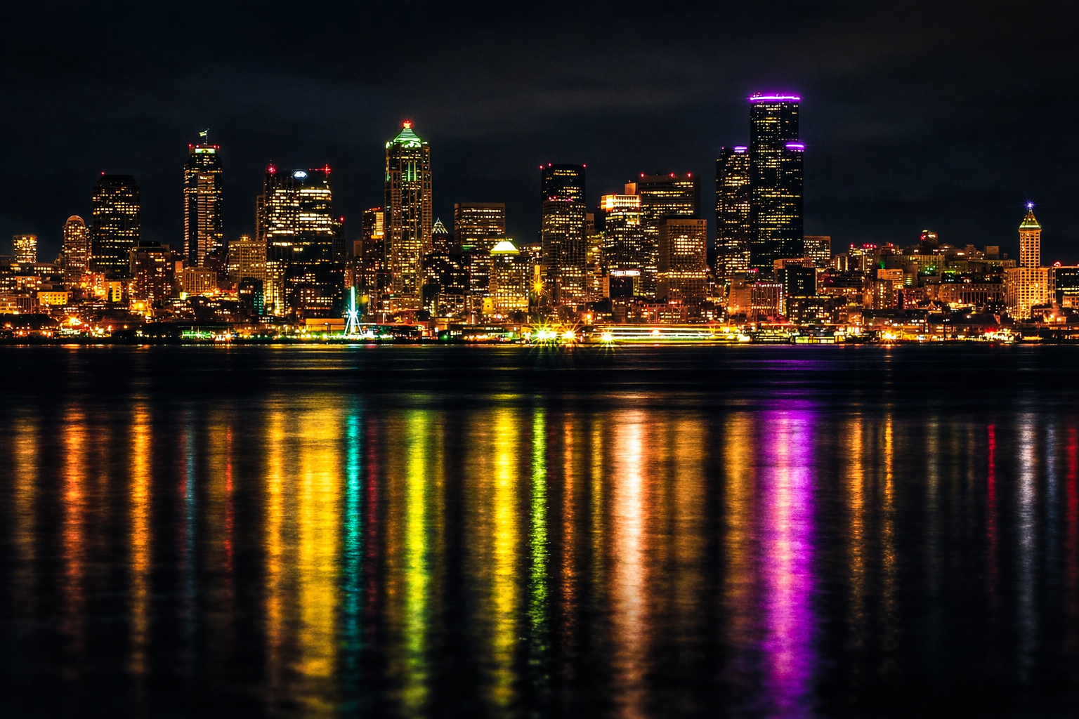 "Color Carried"
The city spills its light across the water, extending itself beyond its edges. Refusing to end, it travels across stillness. 