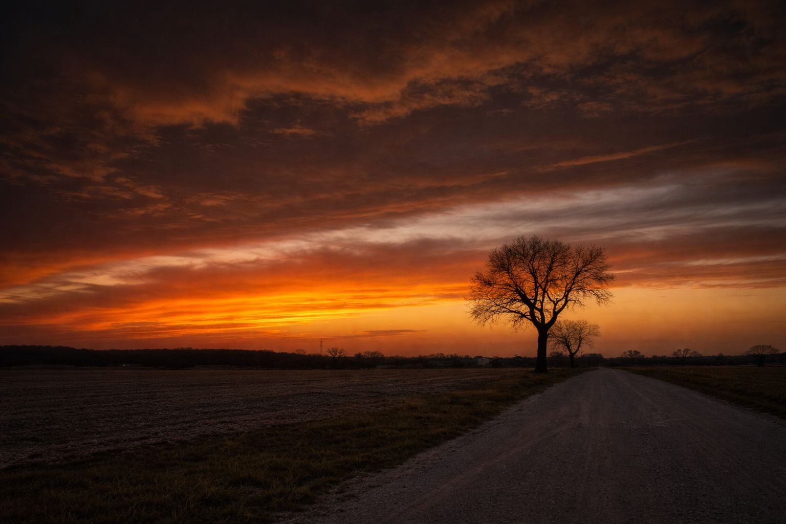 "Road to Dusk"
The path leads into a sky already letting go. Forward remains—but the day does not.