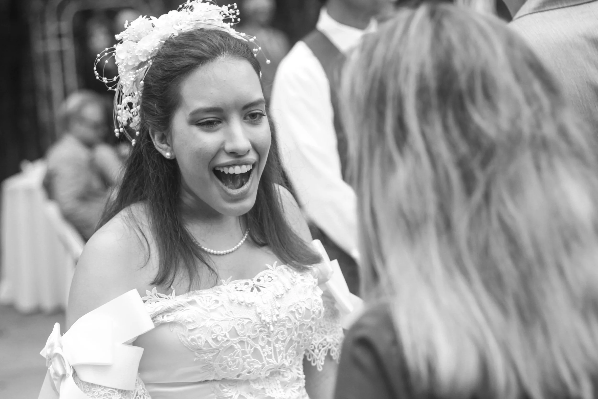 "Unscripted Joy"
She leans into the moment without restraint, laughter breaking through everything else around her. Nothing is held back—this is exactly as it feels.