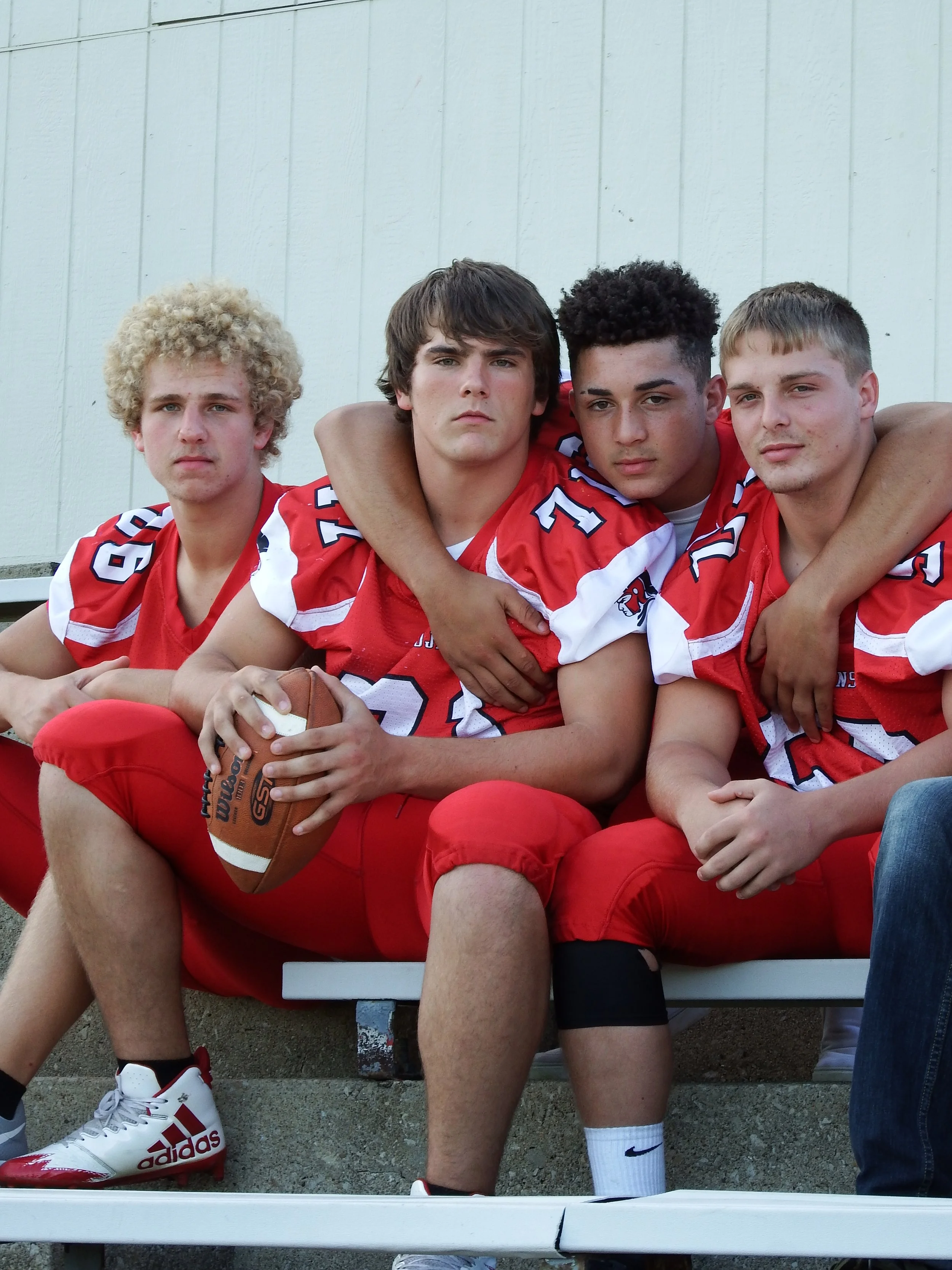 "Forged Together"
They sit shoulder to shoulder, bound by something earned, not given. What they share was built in the fight—and it stays long after the game ends.