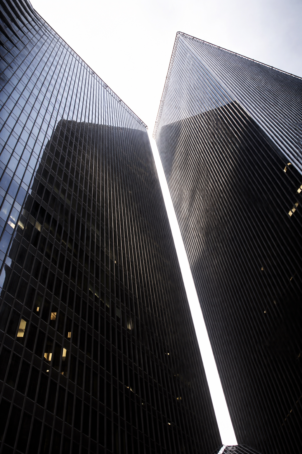 "Drawn Upward"
The buildings rise toward a narrow break in the sky, pulling the eye with them. What we build doesn’t just reach—it directs.