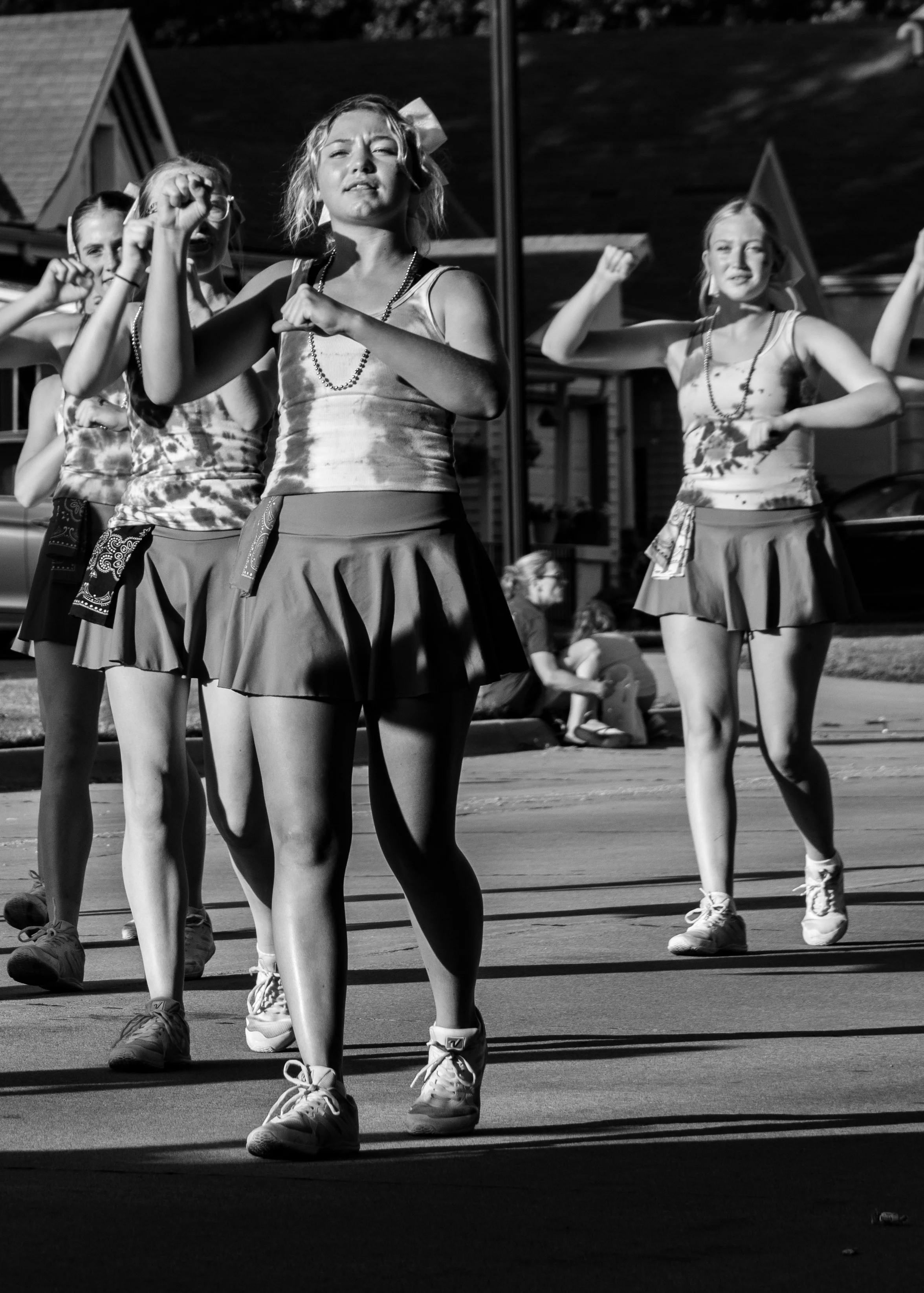 "Passing By"
They move through the frame together, part of something larger than the moment itself. No one stops—the flow continues.